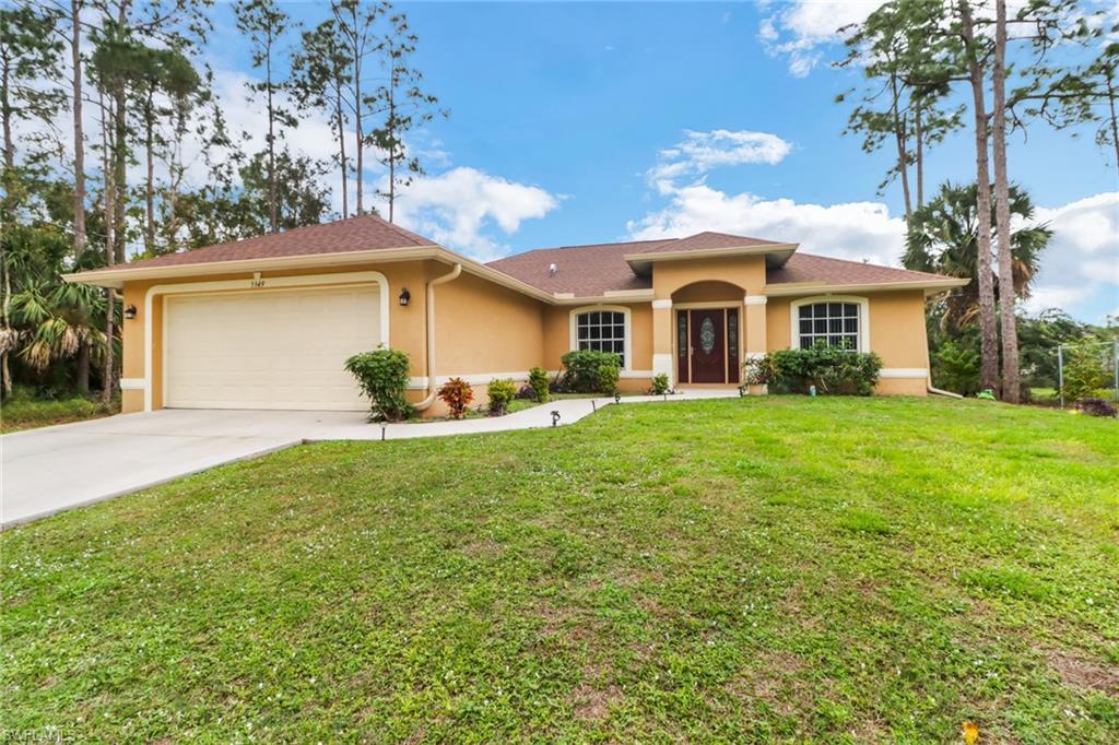 Discover the charm of this meticulously maintained 3-bedroom, 2-bathroom home nestled in the desirable East Lehigh Acres community. Conveniently located for an effortless commute to SR82 and I75, this 2006 gem exudes warmth and comfort.  Step inside to find a home in pristine condition, featuring tile flooring throughout for both timeless elegance and easy maintenance. The cathedral ceiling enhances the overall spaciousness, creating an inviting ambiance that welcomes you home.    All three bedrooms boast walk-in closets, providing not only ample storage but also a touch of convenience. The kitchen, complete with a pantry, is a functional space that harmonizes practicality with style, making meal preparation a joy.  This residence comes equipped with its own dedicated laundry room, featuring a utility closet for added organization.  The backyard has been fenced in for privacy, or for that pet you have wanted!

Why wait for new construction when you can move right into this lovingly maintained 2006 home? Schedule a viewing today and explore the effortless lifestyle this property offers. Don't miss out on the opportunity to call this well-kept residence your own!
