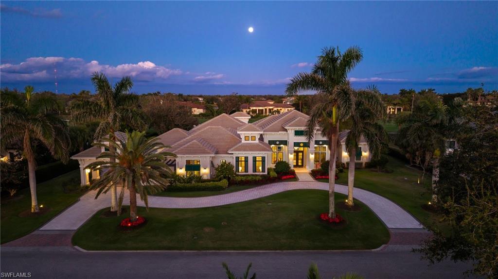 Custom stock built 4 bedroom with den and 2 flex rooms.  Overlooking the 7th hole of The Lakes.