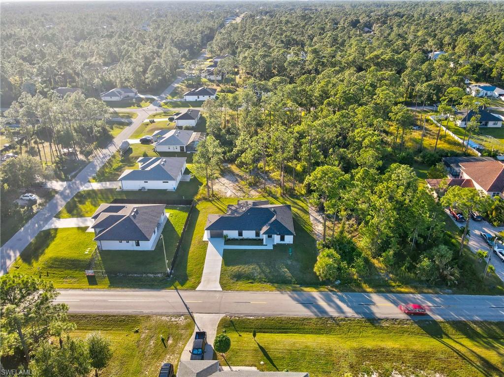 Welcome to one of the first true multi-generational home introduced to Lehigh Acres, a rare opportunity designed for families who value space, privacy, and versatility. This expansive 5-bedroom, 4-bathroom property sits on half an acre, offering room to grow and endless potential. Thoughtfully designed, the home features a mother-in-law suite, easily completed with a simple drywall installation to create a fully private living space. With two full kitchens, a 1-car garage, and all-tile flooring throughout, this layout is perfect for extended families, rental income, or
multi-family living. This property delivers the comfort, functionality, and innovation today’s buyers are searching for making it a standout opportunity in Lehigh Acres.