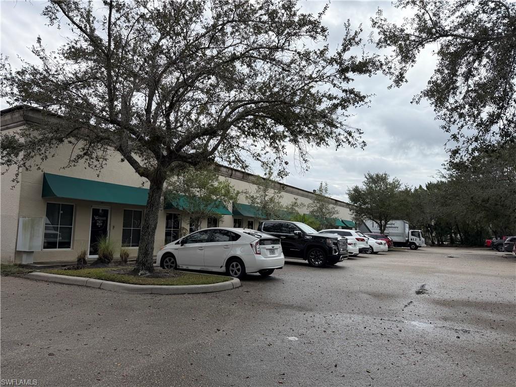 Prime end-cap commercial unit available for sale in a desirable Naples business location. This 2,147 square foot Unit #1 offers excellent functionality and visibility, making it ideal for a variety of business uses.

As an end-cap unit, the property benefits from added privacy and accessibility, and features an overhead door for convenient loading and operations. Inside, the space includes a spacious office area along with flexible open space that can accommodate light industrial, warehouse, service, or professional needs.

Located on Business Lane with easy access to major roadways, this unit is well-suited for both owner-users and investors seeking a versatile commercial property in a strong Naples market.