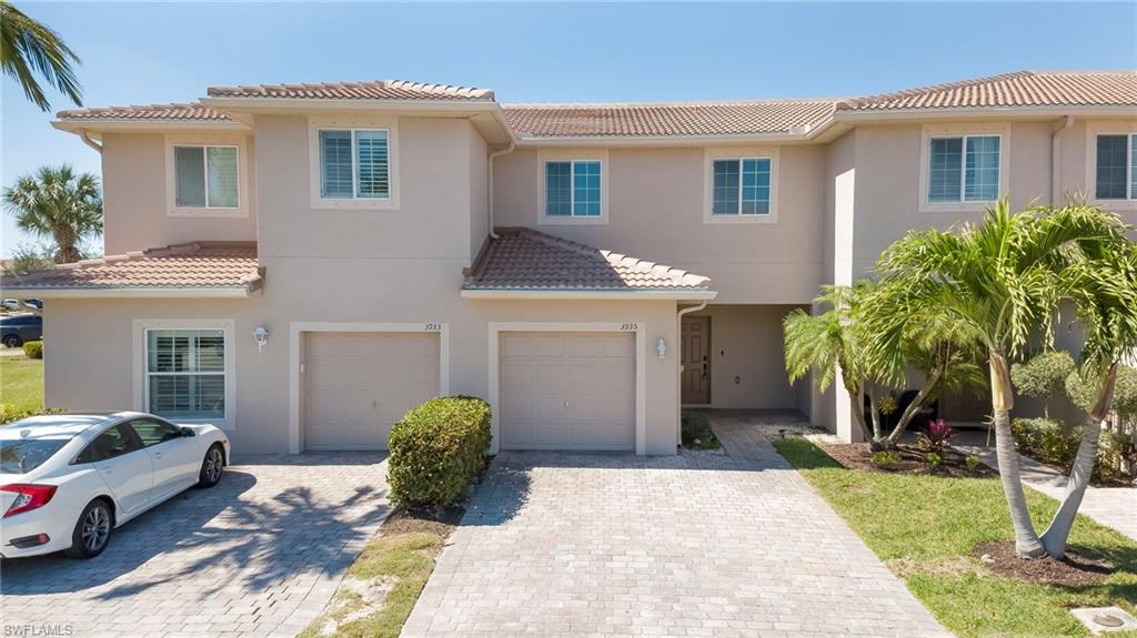 Welcome to this beautifully refreshed 3-bedroom, 2.5-bath townhome in the gated community of San Simeon! This move-in ready residence showcases major 2024 updates including a new tile roof, new A/C system, new water heater, and fresh exterior paint—offering peace of mind from day one. Inside, enjoy tile flooring throughout the main level, freshly painted kitchen cabinetry paired with stainless steel appliances, and
durable laminate flooring upstairs. The spacious owner’s suite features a walk-in closet and tranquil water views. Unwind on your screened lanai overlooking the pond, fountain, and clubhouse—your own private retreat. Additional highlights include Ring door security, keypad entry, and built-in garage storage. Residents enjoy internet service and resort-style amenities including a pool and hot tub, updated playground, fitness
center, and clubhouse. Ideally located near I-75, Southwest Florida International Airport (RSW), shopping, dining, and the new Lee Health Fort Myers Hospital under construction just across the street. Located in a non-flood zone for added confidence. Schedule your showing today and experience the best of Florida living!
