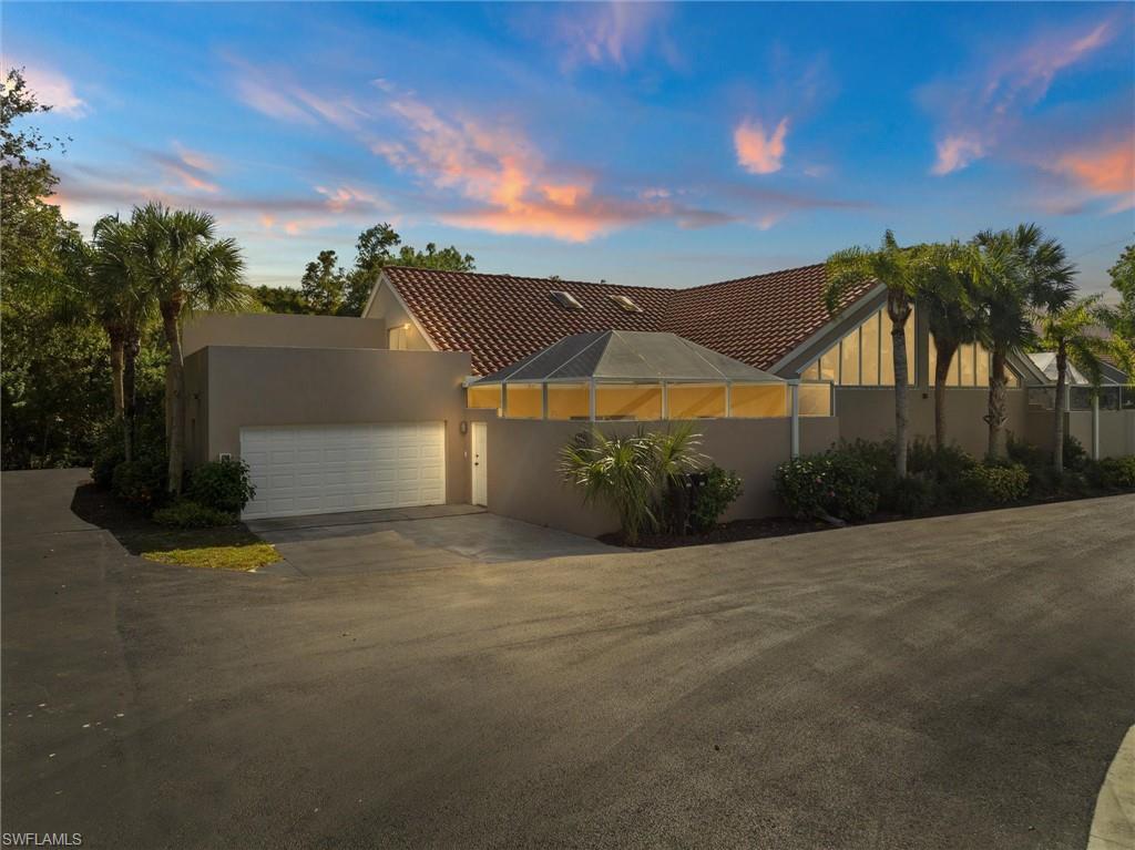 Introducing a rare gem in the heart of North Naples! This exquisite 2 Bed/2 Bath villa with dual dens is perfectly situated just minutes from Vanderbilt Beach/Wiggins state park and all the best beaches in SWFL and surrounded by the best of Naples' dining, shopping, and amenities. With Naples Community Hospital just 2.5 miles away, Mercato shops and A-rated schools nearby, this location is unbeatable. Step inside and you're immediately greeted by an open floor plan accentuated by soaring ceilings and natural light pouring in through skylights. The ground level master bedroom serves as your personal retreat, complete with a spa-like en suite bath. The villa's layout seamlessly integrates indoor and outdoor living. Enjoy not one but two stunning outdoor spaces: a sprawling, nearly 500 sf, screened-in ground level patio and an almost 400 sf private rooftop terrace, both ideal for entertaining or tranquil relaxation all with the ease of a double car garage. Courtyards at Quail Woods community is pet-friendly and offers amenities like a pool and tennis courts. With quick i75 access, this home is a dream come true. Don't miss this unique opportunity—schedule your viewing today!
