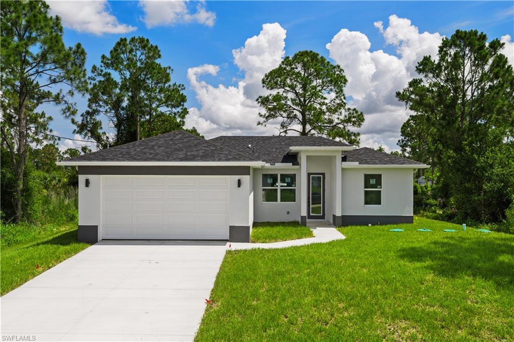 Beautiful brand-new construction ready for its new owner! This home offers a modern open floor plan with plenty of natural light, spacious bedrooms, and quality finishes throughout. The kitchen is designed for both functionality and style, featuring ample cabinet space and a large island overlooking the living area, making it perfect for entertaining family and friends. The primary suite offers comfort and privacy with a spacious bathroom and walk-in closet. Enjoy Florida living with large backyard with plenty of room for a pool. . Conveniently located near shopping, restaurants, schools, and major roads while still offering the peace and space Lehigh Acres is known for. No HOA fees.