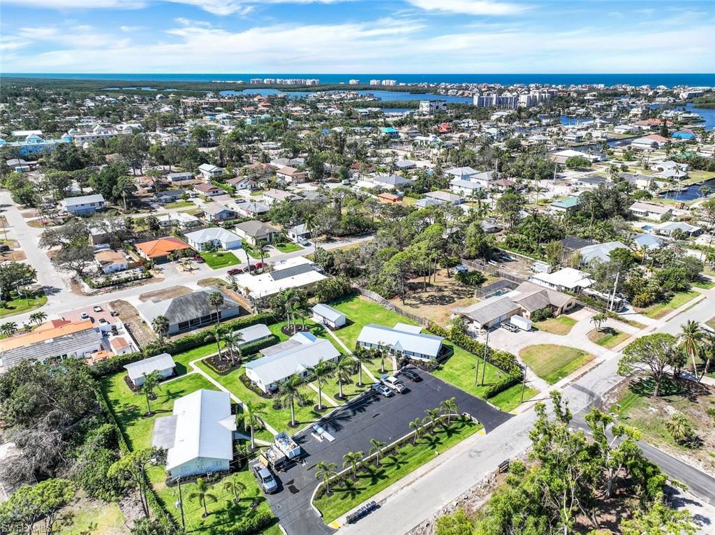 INVESTORS – THIS is the opportunity you’ve been waiting for! LOCATION, LOCATION, LOCATION! Only MINUTES from the FAMOUS Barefoot Beach, this 9-plex is beautifully remodeled! EVERYTHING NEW, including metal roofs, new AC units, shaker cabinets, stainless steel appliances, quartz countertops, washer/dryer in every unit, interior and exterior paint, and so much more! As soon as you set foot on the property, you will notice the attention to detail from the landscaping to the colors of buildings. These modern key-west style units are gorgeous AND come with ANNUAL leases. Annual net income is 228k+ with a 6% CAP rate at list price. THIS is your opportunity to purchase the PERFECT investment property in Southwest Florida’s fastest growing beach town - Bonita Springs. ONLY 1.5 miles from the beach, minutes to groceries, shopping, and restaurants, AND 2 only miles to Downtown Bonita's coffee shops, wine bars, breweries, restaurants, art fairs and more! DO NOT MISS THIS RARE INVESTMENT OPPORTUNITY