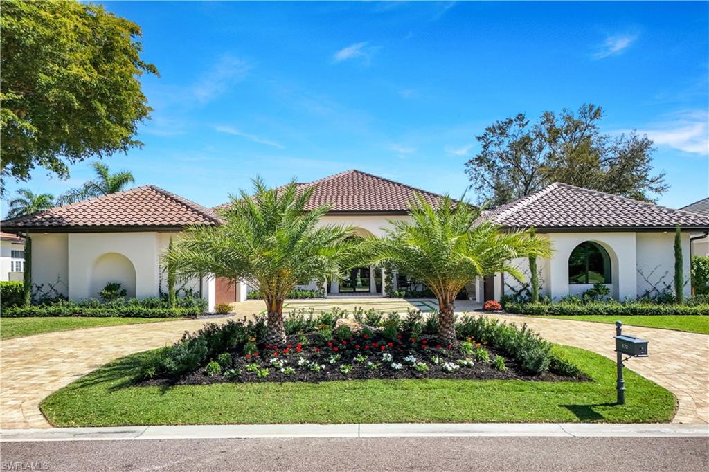 HARD CAP FOR GOLF MEMBERSHIP JUST APPROVED! THIS HOME IS EXEMPT FROM THE HARD CAP! Experience luxury living at its finest in Audubon Country Club, North Naples! This stunning estate home boasts a prime location overlooking a serene water view and the 16th green, all on a spacious 106' wide homesite. The split floor plan ensures privacy and tranquility, with the primary suite in the south wing featuring a sprawling 10' by 30' closet and a luxurious primary bathroom complete with a steam shower, heated Turkish style hammam bench, and a Bluetooth sound system. The north wing has two guest bedrooms, each with en-suite bathrooms, providing a private resort-like experience for guests along with floor to ceiling built in beautiful storage cabinets. Additionally, a separate casita bedroom and bath with a kitchenette offer a secluded space for guests or live-in caregivers. The highlight of this home is undoubtedly the stunning 8' by 5' four-sided glass climate-controlled wine cellar, perfect for wine enthusiasts. The walnut wet bar adds to the entertainment factor, while the gourmet kitchen is a masterpiece with handmade cabinets, a hood fan with inlayed walnut design and top-of-the-line Thermador appliances, including a built-in beverage drawers and an espresso coffee maker.
Step outside to enjoy the 36' saltwater pool with a sundeck and a spa designed for comfort. Golf enthusiasts can practice their putting on the custom poolside green. The climate-controlled 3-car garage is ideal for exotic or collector cars and offers ample storage space.
This isn't just a house; it's a lifestyle. Audubon Country Club offers a range of amenities, including golf memberships, pickleball courts, tennis courts, bocce courts, dining options, and access to kayaks in the inlet waterways. As a Certified Audubon Sanctuary, the community is rich in wildlife and natural beauty.
Located just minutes away from the pristine beaches of North Naples, residents can enjoy the best of both worlds - luxurious living in a gated golf community and easy access to the sun-kissed shores of the Gulf of Mexico. Don't miss the opportunity to make this dream home yours. Schedule a showing and discover the unparalleled features and lifestyle this property has to offer!