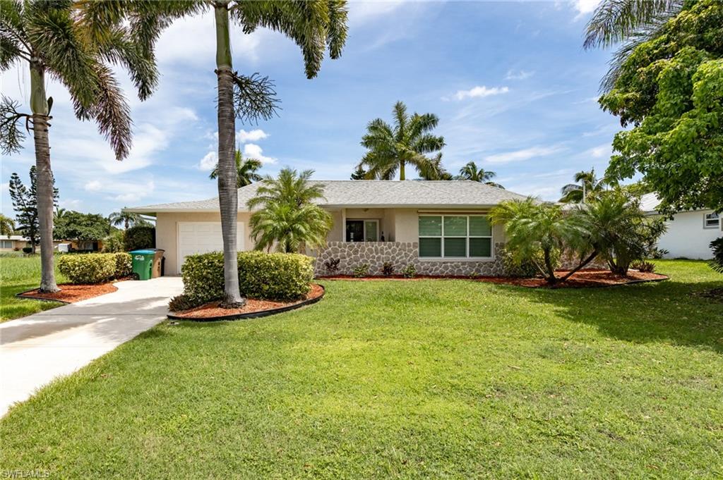 PRICE REDUCED FOR A QUICK AS IS SALE ON THIS HOME BEING SOLD TURNKEY!
Welcome to your Waterfront Oasis! As you walk in the door you will feel at home! This home offers tile throughout, an open kitchen to the family room with a beautiful view of the water and is a great entertaining area for those gatherings with family and friends! Large master bedroom with a walk in closet, the second guest room is so large it can be another master suite, home has beautiful twin light shades on all the windows that give you the option of having the light come through or darkening the room. Great pool area with a large heated pool to relax in on those warm sunny days. NEW TREK DOCK with a new 10,000 lb BOAT LIFT W/SEALED MOTOR AND A GREAT FISH CLEANING STATION. The home has many upgrades such as a FENCED YARD, NEW POOL PUMP, HIGH EFFICIENT WINDOWS IN 2016, NEWER A/C AND HOT WATER HEATER, CENTRAL VAC SYSTEM, POOL ENCLOSURE SCREEN HAS RECENTLY BEEN REPLACED AND NEWER WASHER AND DRYER. 
LOCATED WITHIN MINUTES OF THE BEAUTIFUL DOWNTOWN & YACHT CLUB AREA. YOU ARE TO THE RIVER IN MINUTES WITH A SHORT DISTANCE TO THE GULF OF MEXICO! 
COME ENJOY THE SW FLORIDA LIFESTYLE AND ALL THAT IT HAS TO OFFER!