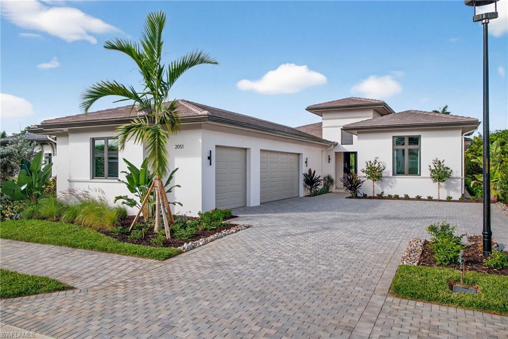 Brand New Construction! This beautifully furnished home is complete and ready for its new owner. The Cameron built by award winning London Bay Homes in the North Naples community of Cambridge Park at Orange Blossom is nestled within this boutique neighborhood of 17 homes.  The Cameron model exudes the elegance of coastal contemporary architecture.  With 3,322 square feet of living space, this 3 bedroom, 3 full and 2 half bathrooms plus study home showcases an open floor plan great room with dining, high ceilings and clean-lined architectural details.  Fabulous for entertaining, is a gourmet-inspired kitchen featuring Sub Zero and Wolf appliances, custom designer wood cabinetry as well as a large island breakfast bar. The open great room with 10' tall sliding glass doors flow to an alfresco space, which offers living and dining areas, an outdoor kitchen, a lavish pool and spa, as well as a firepit.  The home's master suite features a luxurious bathroom with an over-sized walk-in shower, dual vanities and two large walk-in closets. Including the three-car garage, outdoor living and dining areas, the Cameron offers 4825 total square feet. This home is being sold furnished.  Minutes to the Ritz Carlton resorts, gulf beaches, Waterside shopping, Mercato, Venetian Village and fantastic restaurants!