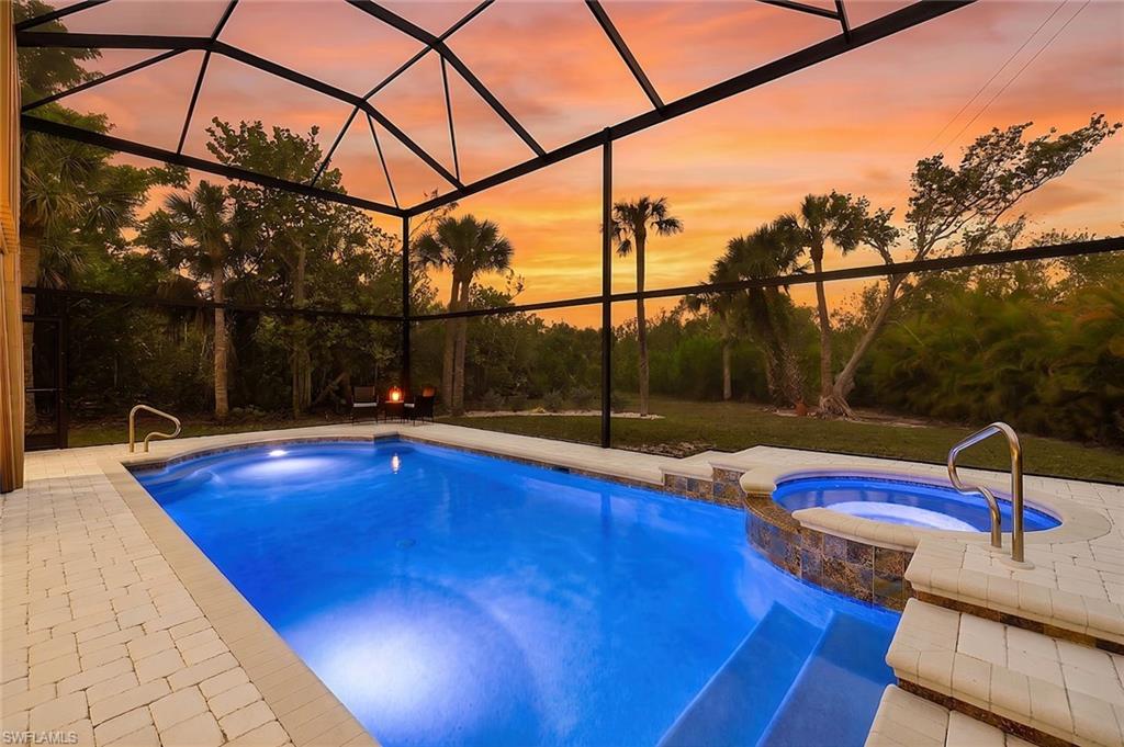 Secluded private island Oasis tucked right in the middle of it All. This
elevated 3/2 with a screened in pool area that has an attached fenced
area is at the end of Sunset Circle with rear southern exposure for
your swimming pleasure. Sit on your deck looking out the back and
enjoy the seemingly endless natural land with all that nature has to
offer. This elevated home has a 2 garage parking area with plenty of
storage for your essentials and even more. This is a must see to
understand all that it has to offer.