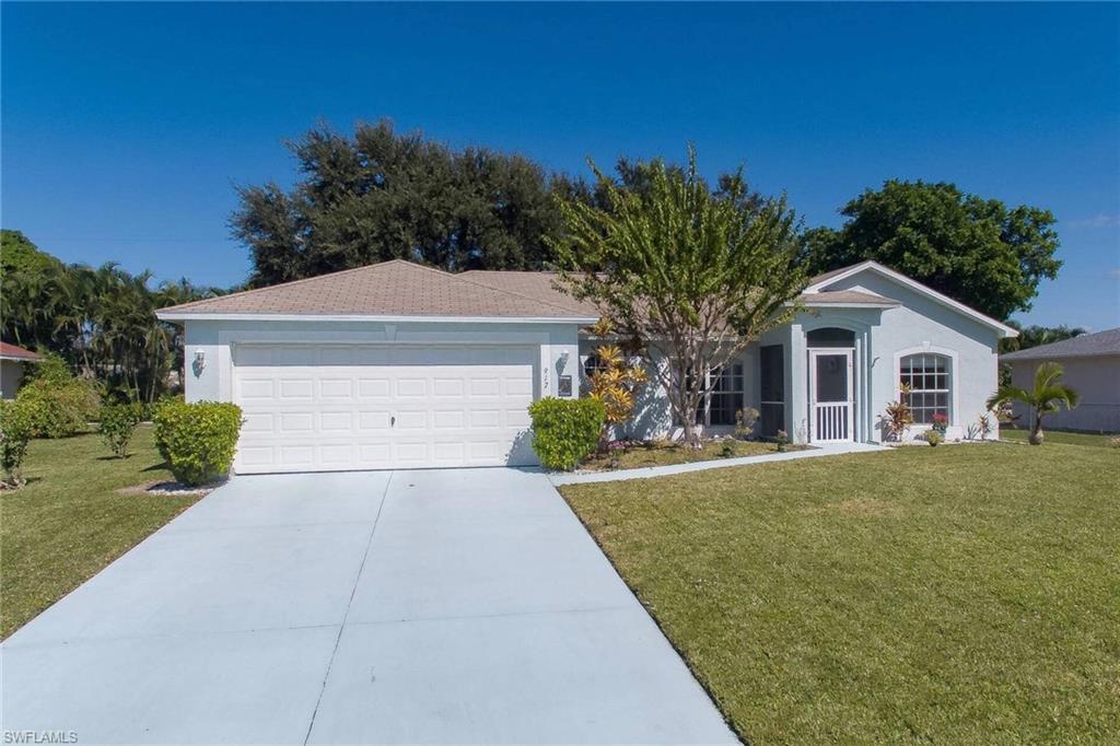 This is a one owner home built by Holiday Builders.  It has an extended lanai into a very private back yard with a privacy fence.  Extra night lights were installed into the yard, and  are perfect for family gatherings or parties.  Relax after  a hard day in your own private spa.  The inside has a wide open floor plan and a beautiful granite kitchen with white cabinets.  A lovely bay window was added to the kitchen as an extra during contraction.   This well-kept home is not in a flood zone and the air-conditioner was replaced in 2020   The garage has an side door for easy access out to the back yard for gardening or relaxing. No flood insurance required. Quote on insurance with present roof or quote for a new roof available.