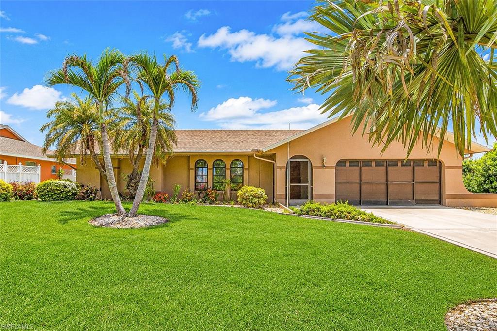 Welcome to this beautifully updated 3-bedroom, 2-bath home offering modern comfort and Florida charm. Inside, you'll find a bright open-concept floor plan with two spacious living areas, soaring vaulted ceilings, and elegant large-format polished porcelain tile throughout. The kitchen opens seamlessly to the living and dining areas, creating the perfect space for entertaining and everyday living.

Step outside to the expansive screened lanai featuring two ceiling fans, a convenient kitchen pass-through window, multiple sliding glass door access points, and a built-in pet door for your small furry companion. The oversized backyard overlooks a peaceful freshwater pond and offers plenty of space to add a pool, garden, or create your own outdoor retreat.

Additional features include a screened two-car garage, a wide side yard with room for boat or trailer parking (subject to local regulations), and beautiful water views.

**Conveniently located just minutes from shopping, restaurants, grocery stores, parks, golf courses, and everyday conveniences in Lehigh Acres, with easy access to Fort Myers. Enjoy nearby recreation at Veterans Park Recreation Center, golf at Ibis Landing Golf & Country Club, shopping at Lehigh Town Center and Lehigh Plaza, and Southwest Florida's beautiful Gulf beaches, including Lovers Key Beach, all within a comfortable drive. Lehigh Acres offers parks, golf, nature preserves, and convenient access to the shopping, dining, and entertainment of Fort Myers.

All information is believed to be correct but it is up to the buyer and buyer's agent to do their due diligence.