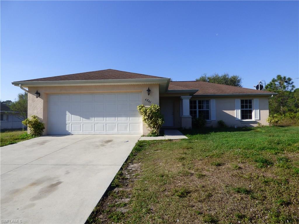 Affordable 3 bedroom 2 bath double garage with screened lanai under truss, located just minutes off S.R 82-5 minutes to I-75, cathedral ceilings, plant shelves, breakfast bar in eat in kitchen, built in desk in hallway between guest bedrooms, indoor laundry room, walk in closet in master bedroom with private bath, ceramic tile floors, storm panels for openings, 2 ceiling fans, all equipment in place.