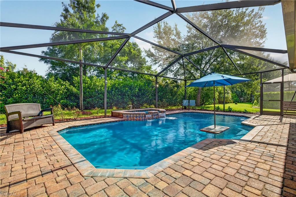 Welcome to this beautifully UPDATED 5-bedroom + Loft, 3-bath POOL/SPA home with a 3-car garage in Magnolia Lakes at Gateway in Fort Myers, Florida. Featuring a newer ROOF (2020) and countless upgrades throughout, this MOVE-IN READY home offers the perfect blend of space, style, and location.
Designed for today's lifestyle, the flexible floor plan includes a first-floor guest bedroom and full bath that also serves as a convenient pool bath; perfect for guests, multigenerational living, or a private home office. Upstairs, the oversized loft creates endless possibilities as a media room, playroom, homeschool space, fitness area, or second living room.
The spacious primary suite is a true retreat with a beautifully remodeled bathroom featuring dual vanity, a soaking tub, walk-in shower, and custom closet built-ins. Two of the additional bedrooms share a convenient Jack-and-Jill bathroom, while every bathroom throughout the home has been tastefully remodeled with modern finishes.
The heart of the home is the updated kitchen, showcasing custom wood cabinetry, granite countertops, BLACK STAINLESS LG APPLIANCES (2022), pantry, abundant storage, and an open layout that flows seamlessly into the living spaces, perfect for entertaining family and friends.
You'll appreciate the quality upgrades throughout, including CROWN MOLDING, UPDATED LIGHTING, CEILING FANS, and stylish finishes that create a warm, modern feel. Best of all—NO CARPET!
Step outside to your own private Florida oasis. The SALT WATER POOL and OVERSIZED SPA invite you to relax year-round, while the built-in umbrella table makes enjoying sunny afternoons effortless. The spacious screened lanai features an updated paver pool deck, privacy-enhancing patio slats, and newly installed landscaping that will continue to mature into a lush backyard retreat.
Additional features include dual A/C systems with Nest smart thermostats, smart irrigation controls, water softener system, newer water heater, epoxy-coated garage floors, overhead metal garage storage racks, MyQ smart garage door openers, updated paver driveway, and an upstairs laundry room. A custom wrought iron staircase railing adds an elegant finishing touch.
Magnolia Lakes offers LOW HOA FEES that include a neighborhood playground, cable, Wi-Fi, lawn care, irrigation, and exterior pest control. Residents also enjoy access to the incredible Gateway lifestyle, with optional social and golf memberships at The Club at Gateway and exciting new amenities underway, including pickleball, bocce, basketball, walking trails, playgrounds, and more.
Ideally located near top-rated schools, shopping, dining, RSW International Airport, and JetBlue Park Boston Red Sox Spring Training Field. This exceptional Fort Myers pool home offers everything today's buyers are searching for. Schedule your showing today!