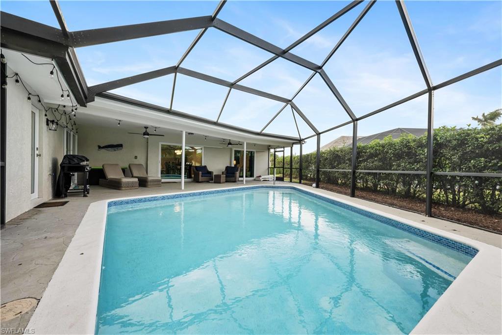 AS SEEN ON TV:  Whether you are exploring nearby beaches & restaurants or spending the week working on your tan by the pool, this fantastic furnished home offers the perfect escape. This completely remodeled 3 bedroom, 2 bath home has a screened pool overlooking a beautiful lake view. Pool has been resurfaced with new tile added & new pool pump. This home has new everything including the furniture. The new gourmet kitchen has white shaker cabinets, stainless steel appl, quartz countertop/backsplash & massive island. Living room & dining room with separate family room. All open concept floor plan. Both bathrooms have been remodeled. Master bath has dual sinks, shower & large walk-in closet. New roof, gutters, stucco & paint on exterior. New interior paint. New LVP flooring throughout. New air conditioner, air handler & water heater. New washer & drying in laundry room with sink. Some new plumbing & wiring. NEW impact windows & sliding doors. Oversized 2 car garage. Oversized irregular lot. In-ground sprinklers use lake water to save on water bill. Kings Lake allows a fence. This property is currently rented by a management company as an "AirBNB" which is currently allowed by HOA.