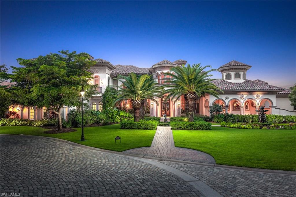 Venice has arrived in Naples. Discover "Cascade De Leone,” a European architectural masterpiece designed for the connoisseur of life. Nestled on a secluded 1.4-acre double lot in Estuary at Grey Oaks Country Club, this Italian villa-style estate blends Old World craftsmanship with modern luxuries. From exquisite woodwork and captivating ceilings to intricate tile and stunning stained glass, expert artisans have created a showpiece that is both elegant and livable. Exceptional appointments include a 1,200-bottle wine cellar, a grand library with extensive custom cabinetry, an elevated piano room and a collection of unique guest suites. The gourmet kitchen is a chef’s dream while the owners’ wing boasts a private sitting room, spa-like bath and extraordinary dual closets. The home’s wide expanses of glass reveal a Romanesque courtyard, complete with a summer kitchen, seating area and fireplace. A magnificent pool and spa, cascading waterfall and gazebo provide the perfect venue for entertaining and relaxing. A moat, gorgeous gardens and meticulous landscaping frame this one-of-a-kind Venetian retreat, which overlooks Estuary’s lush fairways and peaceful preserve.