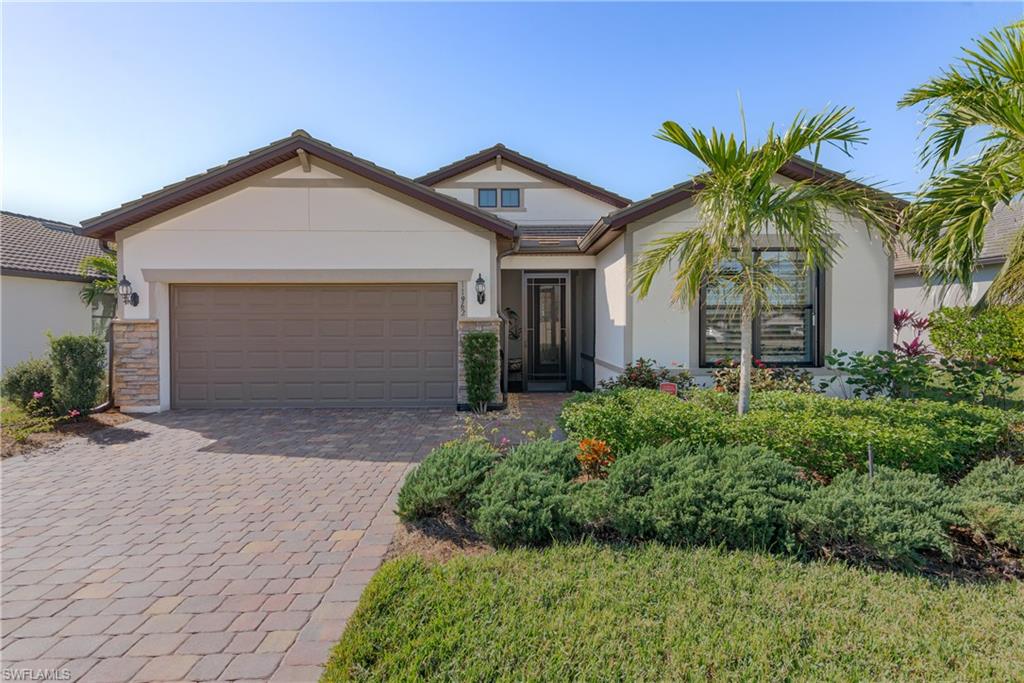 Gorgeous Home on the lake with spectacular views of the sunsets!!! The PICTURE WINDOW SCREEN makes the outdoor space seem huge. The sellers have added a 24x24 extension with extra lanai lighting and lovely landscape lighting. Enjoy living in PARADISE with the amazing outdoor space!! There are PLANTATION SHUTTERS and a beautiful front door that has IMPACT RESISTANT decorative glass built in. The flooring in every room except guest bedroom is a large 18" Travertine tile on the diagonal. The kitchen is a DREAM! Quartz countertops and backsplash,under cabinet lighting, cabinets with roll out trays and pull out trash bins! The home is protected with ACCORDIAN SHUTTERS and ELECTRIC STORM SMART HURRICANE SCREENS around the lanai. The sellers have added a WHOLE HOUSE WATER FILTRATION SYSTEM and a WHOLE HOUSE SURGE PROTECTOR! 
This is a SMART HOME so AC, locks and alarm system can be controlled remotely. The garage has two large elevated garage racks for storage. Extra electrical outlets have been added to the lanai and the front porch. The home has PEST CONTROL TUBES in the walls which is such a convenience and safer for pets. METICULOUSLY maintained!!! This home will be a joy to show!!
