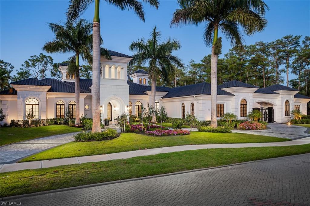 H8191  Completely renovated luxury estate offered in Naples’ coveted Quail West community! This masterpiece sits on a nearly 1-acre lot with beautiful golf course views, a park-like setting & one of SWFL’s finest outdoor entertainment areas with resort-style pool/spa, water features, state-of-the-art outdoor kitchen/bar with Taj Mahal granite & super screen picture window enclosure. This light, bright & airy 4,972 sq ft home offers 4 bedrooms, custom wine room/bar with a 650-bottle wall, European oak hardwood floors & two 2.5-car garages with motorized gate. Pristine in every way, this home includes 3 new 2022 HVAC units, new whole-home generator & water filtration system. Gorgeous chef’s kitchen has white cabinetry, high-end granite counters & oversized walk-in pantry. Spacious master boasts a spa-like renovated bathroom with freestanding tub & steam shower. Offers hurricane impact windows, smart home automation with Lutron lighting & Sonos speaker system. Showcase of visionary design. Quail West Golf Membership available with no waitlist! Nearby Mercato, Waterside Shops, Naples 5th Avenue! Quail West offers 2 championship golf courses, 100,000 SF clubhouse, tennis, fitness, spa & more.