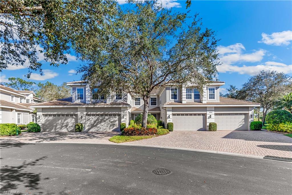 Rarely available spacious...2nd floor 2,700 sq. ft condo with private elevator in the gated community of Kensington Golf & Country Club. This residence offers 3 large bedrooms+den/ 2.5 baths & 2 car attached garage. The setting, the best of all worlds, the view from the living areas are wooded offering privacy but enter the lanai see views of both wooded areas & golf course/lake views. Upgrades include new tile and vinyl floors in the bedroom, living area, and den replacing carpet, plantation shutters, & painted throughout. Kitchen w/granite countertops, so spacious with breakfast nook  opening up to both the living area & den. Nice wrap-a-round breakfast bar offers so much storage with double pantries, center island, and pull out shelves. The owner's bedroom offers walk in closet and ensuite bath. Bath w/granite counters, new frameless shower door and water closet. This community offers a pool & friendly community center or join the private club. Membership to Kensington is optional offering social, sports or golf. So much to do w/tennis / pickleball / bocce courts, restaurants, pool and non stop events. So close to restaurants, the beach and all Naples has to offer. Pet friendly!