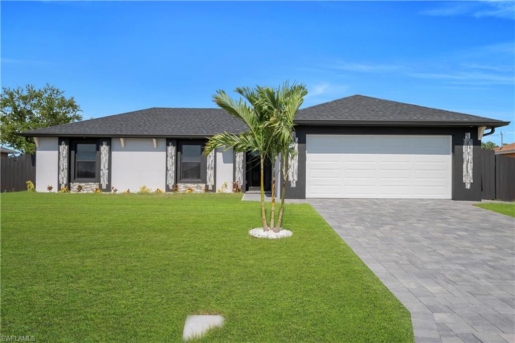Welcome to your dream home in Cape Coral! This stunning single-family home boasts 3 bedrooms, 2 bathrooms, and a 2-car garage, perfect for families of any size. The in-ground pool is the perfect spot to relax and unwind after a long day, while the fenced backyard provides privacy and security for your loved ones. The modern touches throughout the home, including tile counters, stainless steel appliances, and tile flooring, give it a sleek and sophisticated feel. Located in a desired area of Cape Coral, this home is near everything the city has to offer, from shopping and dining to entertainment and outdoor activities. Whether you're looking to enjoy a day at the beach or explore the vibrant nightlife, this home is in the perfect location to experience it all. Don't miss out on the opportunity to make this pool home your own and start living the Florida lifestyle you've always dreamed of. Schedule a showing today and make this house your forever home!