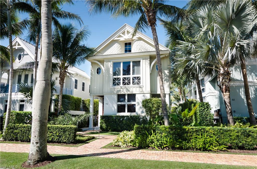 This unique home was built in 2012 on a beautiful tree lined street in the middle of Olde Naples, and it is full of charm! Boasting 2,971 feet under air, this home has three bedrooms, three and a half baths, a beautiful kitchen, and a living-dining area. Inside/outside entertaining is a breeze with the courtyard-like design of this home. Wonderful landscape design with pool, spa, outdoor trellised dining areas, and an indoor/outdoor sunroom which effectively converts from an open space to an under air room with disappearing sliding doors. Wide plank wood flooring throughout, marble and granite tops, and high end appliances round out this great place you’ll be proud to call home.