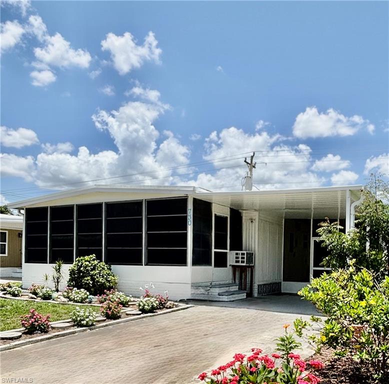 ADORABLE 2-BED, 2-BATH HOME IN 55+ FOREST PARK WHERE YOU OWN THE LAND AND PAY $122/MONTH HOA FEE. Home has many impressive upgrades making this a perfect choice for your Florida home, including 2022 roof over, newer vapor barrier (tie-downs inspected), re-pipe in 2020, and on a termite service plan. Beautiful luxury vinyl flooring, stainless kitchen appliances, newer white aluminum windows, along with a spacious screened side lanai and a sun room across the front of home are additional desirable features. 
Forest Park is a great community offering friendly neighbors, activities, shuffleboard, holiday parties and other amenities. Forest Park is close to shopping, restaurants, major roadways, and just minutes to downtown Fort Myers. Come and enjoy the Florida lifestyle in your new home. Your pet will like it too!