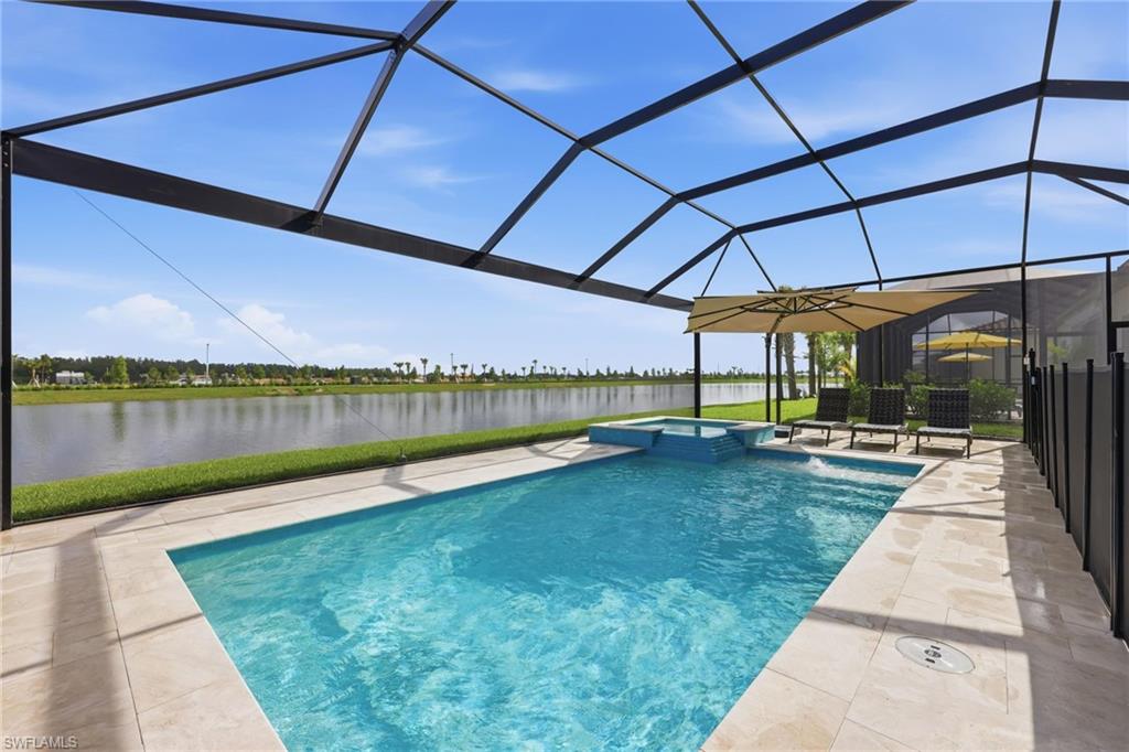 CUSTOM SALTWATER POOL + SPA | 2.5 CAR TANDEM GARAGE and better than new!

This 2023-built 5 bedroom + den + loft, and 4.5 bath home delivers the space, upgrades, and lifestyle buyers are looking for right now. Ave Maria ~ "Once you get here, you get it".

Step outside to your CUSTOM 2024 SALTWATER POOL & SPA, finished with Diana Royal marble non-slip pavers and a panoramic picture screen overlooking the pond—private, peaceful, and designed for entertaining. LED color-changing lighting is fully remote controlled for day-to-night enjoyment.  Child safe pool gate conveniently has 2 doors for easy access to and from pool area with additional childproof features for opening the doors.  Another layer for pool safety is inside the home on the sliding glass doors.  Both sliding glass doors have alarm/sound when the doors are opened.

Inside, the home is thoughtfully upgraded with motorized shades on sliding glass doors and dual A/C systems for efficient comfort between upstairs and downstairs. The kitchen stands out with upgraded Bosch refrigerator and dishwasher, blending style with everyday function.   Quartz countertops, pull out shelving in lower cabinets, and huge island make it a cooks dream for efficient space.  Whirlpool range has air fryer feature, convect bake, and self cleaning!  The utility tub in upstairs laundry room can be a life saver!  The extra deep 2.5 tandem car garage is a MUST HAVE for extra space!

Function meets convenience with an expanded paver driveway (an extra 2’ on each side) for easier parking, loading, and added play space, plus additional pavers along the side yard. The 2.5 car tandem garage offers extra storage, flexibility, and room for a golf carts, and includes an additional refrigerator/freezer.

Positioned across the street from a beautifully landscaped area—not another garage—this home offers a more open and attractive view.

Move-in ready and available in time to be settled before the next school year, with multiple schools within walking distance.

Living in Ave Maria is a lifestyle—beautiful parks, walking and biking trails, a vibrant town center with dining and shopping, year-round events, and a true sense of community that draws people here from all over the country.