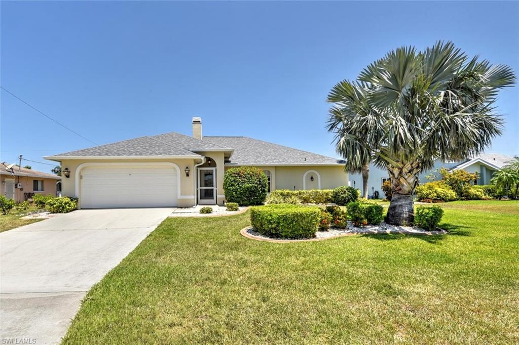 Take a look at this lovely spacious pool home with PAID ASSESSMENTS! This move-in-ready 3/2 pool home is located in the prime area of SE Cape Coral with access to all that both Cape Coral and Fort Myers have to offer. It has been immaculately maintained, with the desired split-floor-plan and open kitchen (with new stove) that is perfect for a full-time resident or even as an investment property. Featuring a new roof (2022), AC (2015), granite countertops (2017), pool pump (2020), and pool resurfaced (2022); with solar and electric pool heating, and a fenced-in yard. The main bedroom has great space that opens to an ensuite bathroom, double sinks, granite countertops and large closet space. Upon entering the lanai and pool area, you will find a perfect area for entertaining or just enjoying the beautiful landscaping while watching a gorgeous sunrise or sunset. Sellers are motivated! Schedule your showing today and bring us an offer!