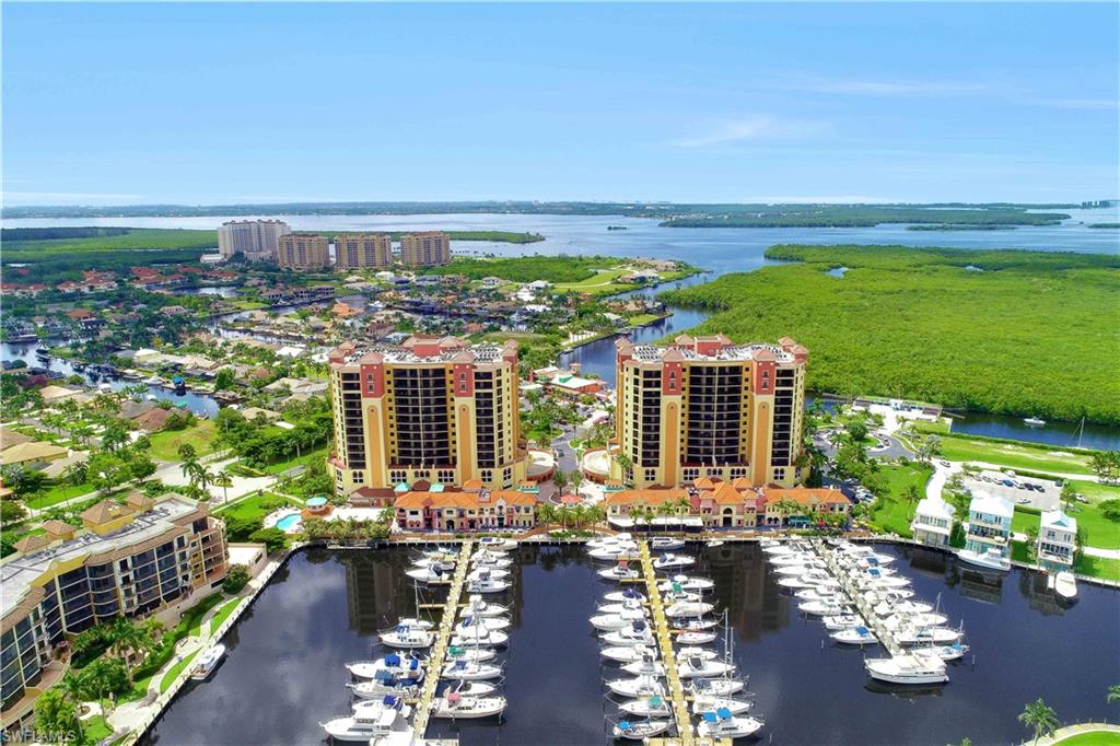 Welcome to Cape Harbour, a luxury condo/boating community with plenty to see and do only footsteps away from your 9th floor Eleuthra model floor plan home.  After a long day exploring shops, boating and fine dining, come home to this 3 bedroom 2 full bathroom condo with views overlooking the river. This unit is move-in ready! The kitchen boasts plenty of cabinetry and counter space for entertaining with a large pantry. Granite counter tops and matching black appliances enhance the finishing touches of this open concept kitchen with a large breakfast bar. The split bedroom floor plan makes it ideal for visiting family and friends as they enjoy the views with their own screened lanai and guest bathroom. The master bedroom suite hosts a walk in closet and a ensuite that includes dual sinks with a large walk in shower. This unit is ideal for primary residency or as an investment unit for rental purposes. Unit has a large Bonus room. Enjoy walking to shops, Rumrunners, Fathoms, French Connection restaurants. Amenities include Marina, boat storage, tennis, fitness center and two pools. Call for a private showing or for any further details!