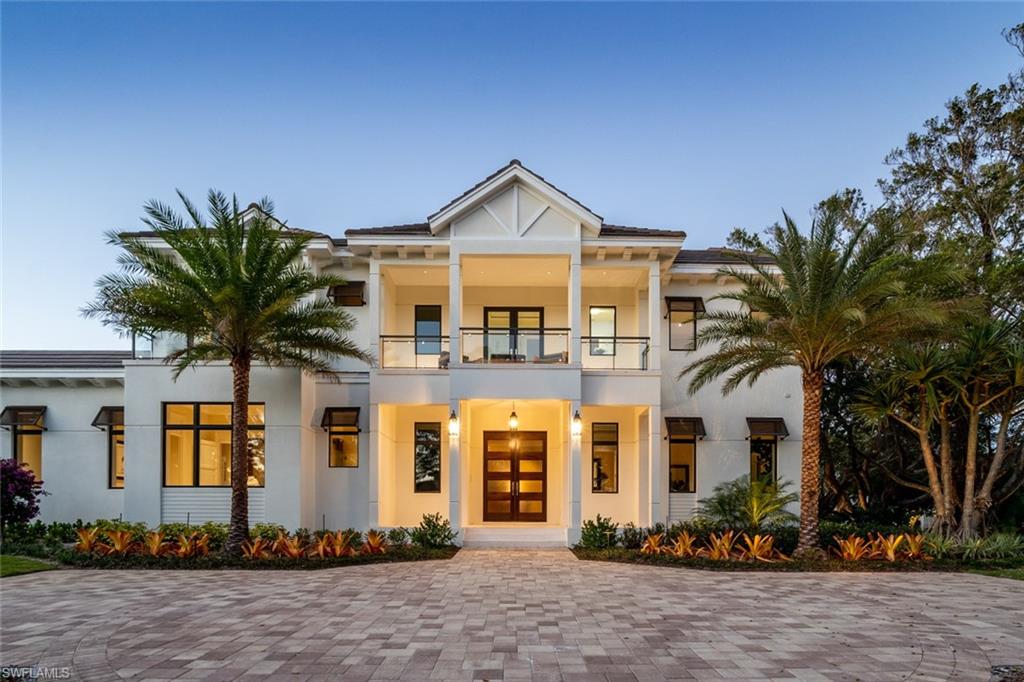 Kings Court - Completed February 2019. A Classic and sophisticated architectural masterpiece crafted by AVA Builders and designed by Kukk Architecture & Design on this large corner lot that is just a block from the prestigious Port Royal Club with world class beach service and amenities including tennis, spa, and fitness training. Built to the exacting standards of AVA with an interior commissioned by Lisa Kahn Designs; the home is sure to impart a refined yet casual elegance that will connect with the outdoor features. Large spans of glass pouring in natural light and outdoor living spaces providing quiet peaceful surroundings soak up the sun with a SW orientation of the custom pool and spa. The office / study portrays the feeling of sitting under the canopy of the banyan trees. The four guest suites are generously and luxuriously appointed. A large ground floor master suite has his & her baths, dressing rooms, and a sitting area that walks out to a fire pit deck for serene evenings spent gazing at sunsets and the stars that follow them from the privacy of your tropically landscaped outdoor sanctuary.