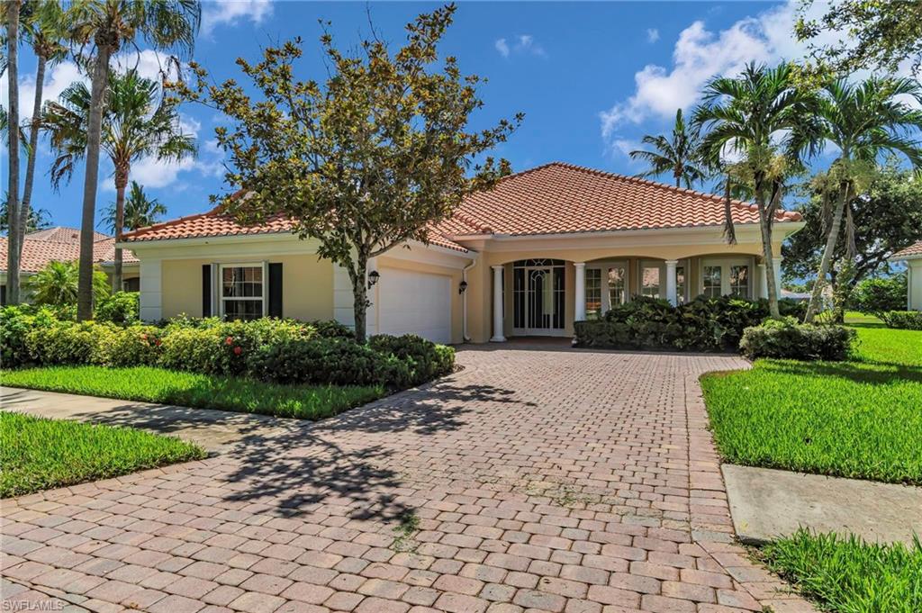 Welcome to the beautiful Island Walk gated community! This stunning single family home, boasting 2721 square feet of living space, is one of the largest Carlyle models and offers so much for its lucky new owners. With 4 bd/3.5 baths/2 car garage, this spacious home has plenty of room to grow. Beautifully landscaped with gorgeous lake views and lots of privacy, you can enjoy all that Island Walk has to offer – including it's amazing Town Center amenities like a post office, cafe, resort style pool with tennis courts and putting green – perfect for keeping active! This home also features bright open concept living spaces with porcelain tiles throughout as well as brand new stainless steel appliances ready for use in your dream kitchen.  Sliding glass doors providing that WOW factor overlooking the lake. Master en-suite w/his/hers bathroom w/tub & shower. You will have peace of mind knowing that this home comes complete with impact windows (2021), new roof from (2019), water heater from (2018) plus fresh paint inside & out (2023), New Ac from (2021) If convenience is what you're looking for then this property won't disappoint - located close to schools, shopping malls & more.