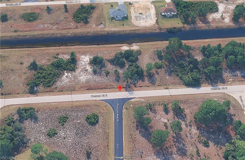 You've just found one of the lowest-priced 1/4+ acre parcels in the desirable southeast area of Lehigh Acres! The seller is offering two side-by-side lots separately totaling nearly 1/2 acre when purchased together, providing extra space and endless possibilities for your future home. A 50-foot-wide canal behind the property offers added privacy, extra breathing room, and a great spot for fishing. The highly desirable southern rear exposure provides excellent sunlight throughout the day; perfect for designing your dream home with a pool. An electric pole is located nearby for convenient utility connection, and the lot requires very little clearing, helping reduce your building costs. Conveniently located just minutes from elementary, middle, and high schools, golf courses, shopping, and SR-82, you'll enjoy easy access to Fort Myers or head east toward Fort Lauderdale and Miami via Alligator Alley. Whether you're ready to build now or invest for the future, this is an outstanding opportunity. Seller has a total of 8 vacant lots located in S.E. Lehigh that are available in side by side pairs, please see additional remarks for total list of addresses.