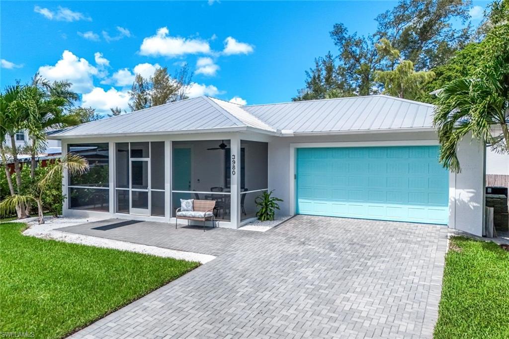 Charming 3 bedroom, 2 bathroom creek-side home in vibrant Bayshore Arts District - an exciting artistic enclave of waterfront dining, live music, art galleries & unique shops. Nearby Naples Botanical Garden offers a 170-acre world renowned tropical oasis. Adding to this home's ideal location is close proximity Bayview Park known for its scenic views of Naples Bay, boat launch/fishing, playgrounds, walking trails, kayaking. East Naples Community Park, a vibrant hub of activity & home to the famous US Open Pickleball Championships is just around the corner. In addition to its wonderful location, the home features an inviting outdoor patio for dining alfresco, as well as a front screened lanai where you can sit and enjoy your morning coffee. Efficiently designed, the kitchen has granite countertops and stainless-steel appliances. Built in 2018 the bright & light home has hurricane rated impact doors and windows & had no damage or water from any of the recent tropical storms. Furnishings are negotiable with possibilities for an investor -- or just move in and enjoy it right now!