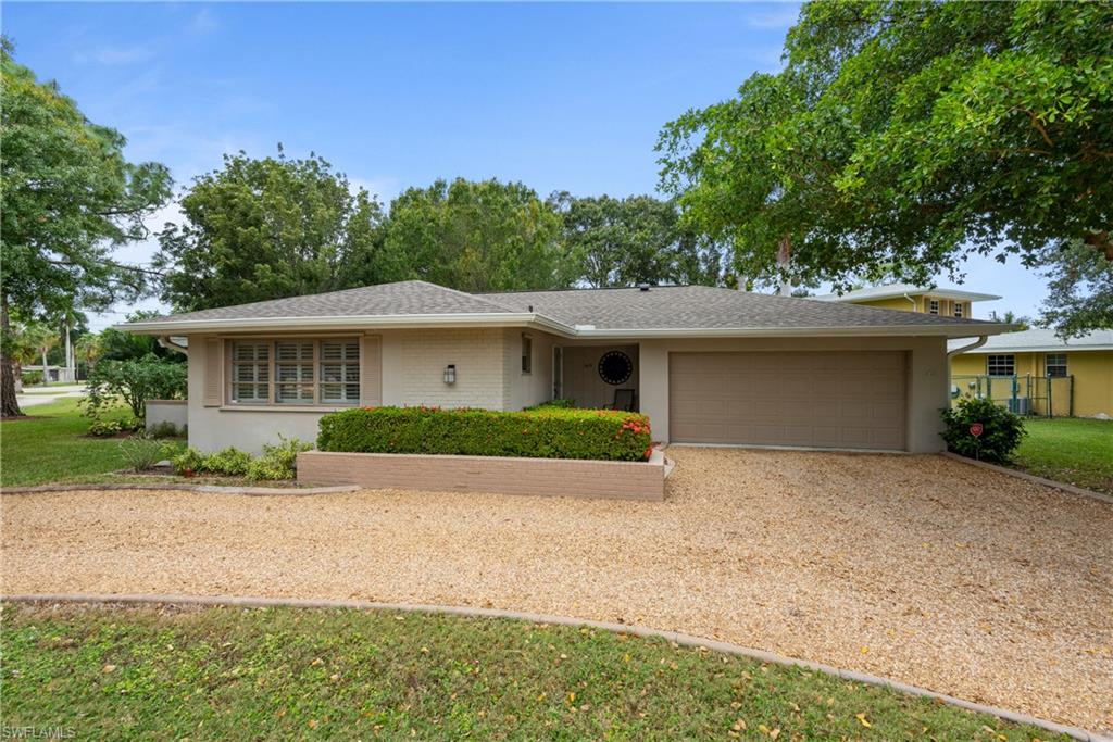 McGregor area gem….this 2 bedroom, 2 bath + home office is a rare find. Large corner lot, circular driveway, fenced yard and attention to detail are just a few of the perks this property offers. Home is in pristine condition with a new roof in 2017, shutters, large tile flooring, crown moulding, plantation shutters, recessed lighting and updated kitchen + baths. Gourmet kitchen features custom cabinets, granite, double oven, pantry, pendant lighting + built in bar area with plenty of storage. Spacious living room with views of the beautiful landscaped backyard and large screened lanai. Master suite offers custom cabinetry, large shower and ample closet space. Other details include indoor laundry with laundry tub, home office, 2 car garage and sprinkler system on well. This beautiful home is in one of the most desirable locations off of McGregor..book your private showing today!