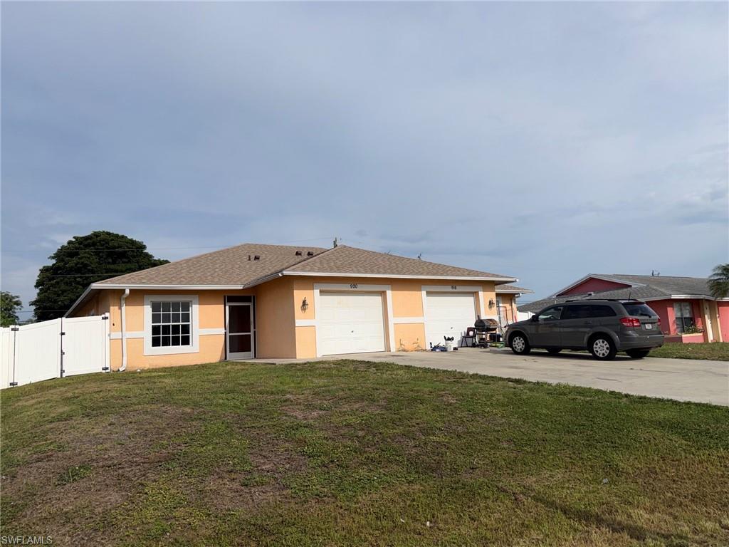 Duplex located in SE Cape Coral Florida, great potential income for rentals, needs a bit of updating on one side, however the price is right to do so!
Each side has 3 bedrooms, 2 baths and is 1205 sq ft, laundry in-residence, walk-in closets in master bedroom, private screened in lanai each side, 1 car garage each side and private fenced in back yard each side! Duplex is a total of 2410 sq ft Roof 8-2-2019, high grounds- not in flood zone, never flooded, AC units 2024 & 2025.
Call for your private showing today.