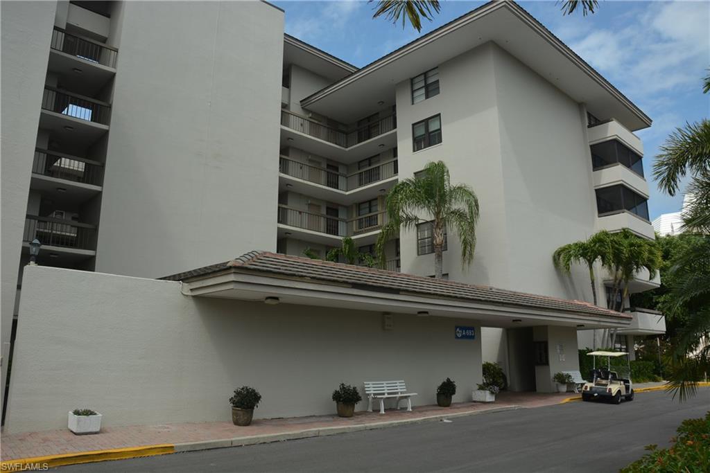 The MOST AFFORDABLE Gated Community on Marco Island with resort like amenities, private access to beach & boat docks, Har-Tru tennis courts, bocce and pickle ball, shuffleboard, common/convenient kayak storage, barbeque grills, walking paths and convenient to shopping and dining. This private end unit in a low density mid-rise has a spacious foyer, extra square footage and windows, a tiled & screened wrap-lanai with views of the bay. The 2 bedroom 2 bath condo has tile throughout and newly decorated with washer and dryer in unit.