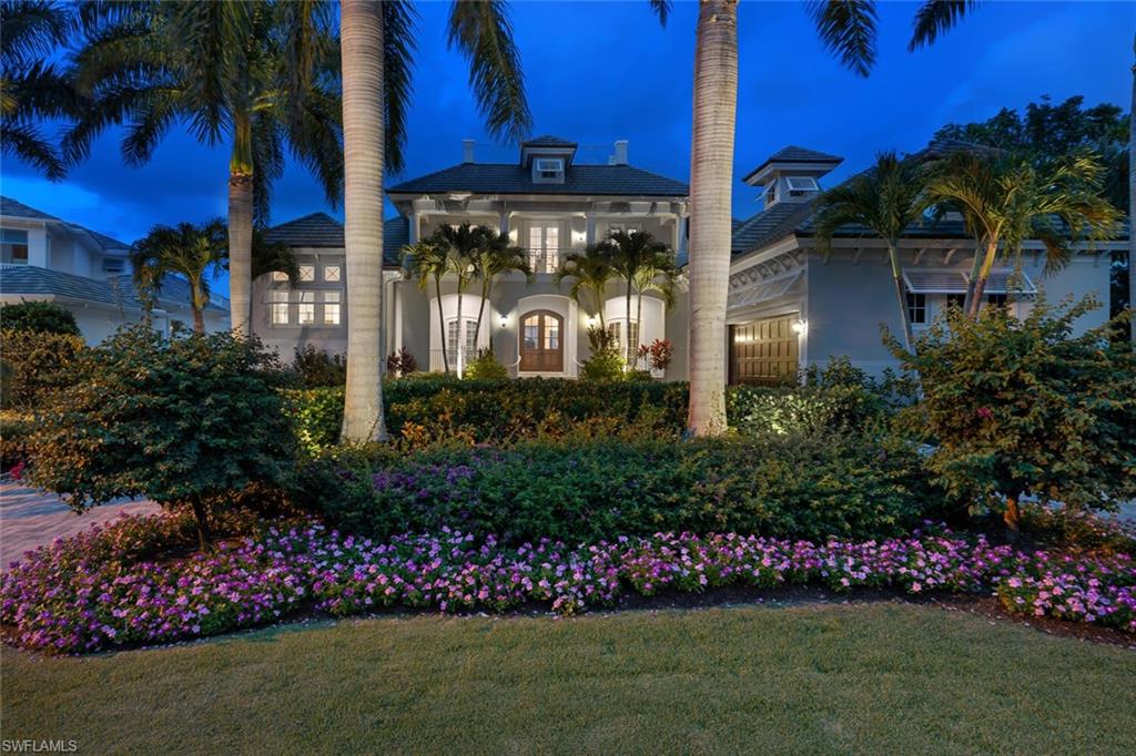 One of the best views in the Moorings, this classic Key West style home offers expansive views from every room. OVER 100 FT WATERFRONTAGE! *** The significant amount of glass allows for natural light to fill the residence. The custom kitchen features exquisite selections of granite & Wolfe appliances, including a triple oven gas range, all surrounded by classic Ruffino custom cabinetry, refrigerated drawers & separate ice maker. The spacious master suite offers the perfect setting to unwind with a walk-through shower, featuring multiple showerheads, double walk-in closets & private access to the luxurious pool and spa. Beautiful wood paneled office, elevator/stairs to 2nd floor with 3 additional en-suite bedrooms, all with private terraces & views, family room and exercise area. This residence has complete hurricane protection, wood paneling ceilings on the lanai, built in summer kitchen. Residents will enjoy the ambiance of the fire pit & pool water features, while gazing at the vibrant colors of the Naples sunset from the spacious dock large sun deck with a 24,000 pound boat lift & jet ski lifts. Whole house generator, new HVAC & water heaters. !