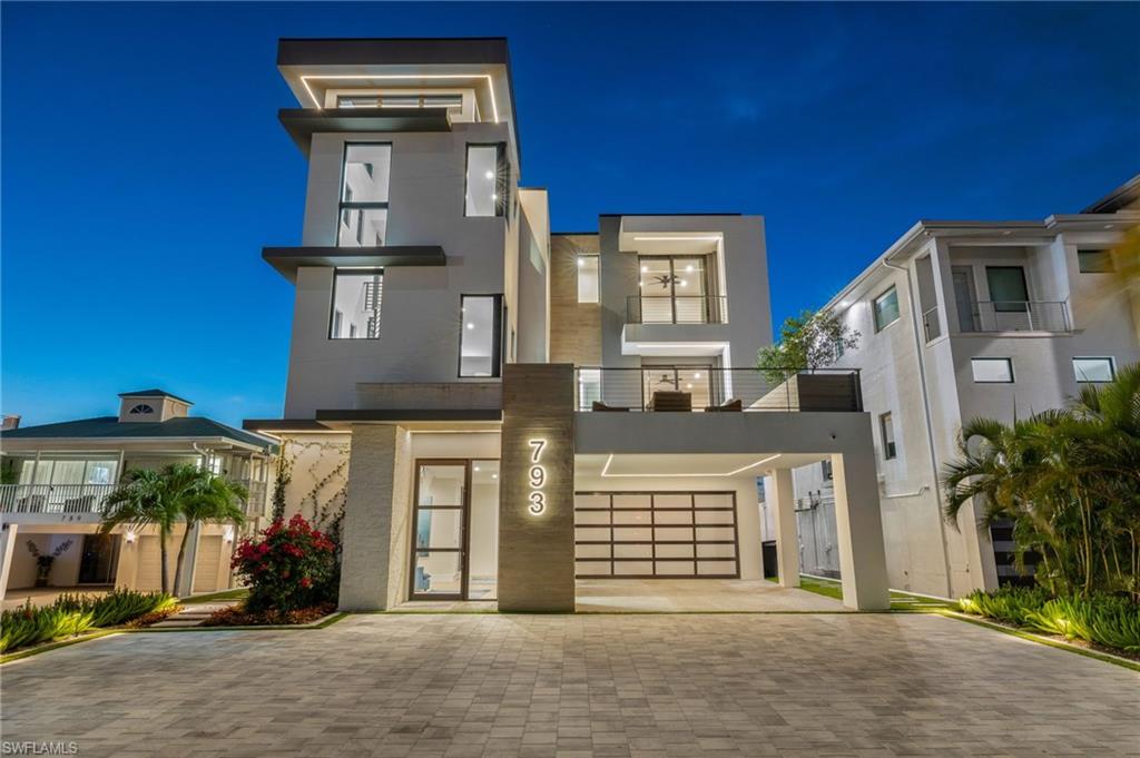 This is 793 San Carlos Drive—less a house and more a waypoint on the map of a life well-lived. A modern coastal refuge tucked into the salty heartbeat of Fort Myers Beach, where the air smells of sunburnt afternoons and the tide keeps its own kind of time. Built the right way—block and steel from the ground all the way up to the roof. Perfectly positioned for those grand, cinematic sunsets that spill across Matanzas Bay, the kind you watch in silence because words just get in the way. Built for poolside barbeques that run late, for Florida winter nights when conversation drifts like smoke, for slow bike rides to seafood joints where the fish are still telling stories from the Gulf. 

Inside, two primary suites and four guest rooms, all en-suite, make it the sort of place where family converges, friends linger, and nobody feels like they drew the short straw. It’s a home that doesn’t just host memories; it cooks them slowly, like something that gets better the longer you let it simmer.


The kitchen is the soul of it all. Mid-century esque meets modern, a space begging for simple ingredients, good knives, and better company. From here, you can watch the world wander by on the water while you stir, chop, taste, and exist—exactly as you are. From the terrace, the view opens in soft, deliberate layers—first across untouched Grayson Island and its protected bird sanctuary, then out toward the distant shimmer of Fort Myers Beach’s skyline, with the Sanibel Causeway stretching quietly along the eastern edge of the horizon.


Up top, the dual primary suites hide away like little sanctuaries, each with wide-open views that remind you why people chase the horizon in the first place. Everything inside has been curated with a sharp, contemporary eye—furnishings that feel effortless, textures that feel intentional. It’s the kind of place you can step into and immediately exhale. Turn the key, and you’re already living the life.


With Control4 automation, hidden surround sound, a Tesla charger, Generac generator and a build engineered to shrug off coastal moods, this home blends luxury with durability. A place made for people who appreciate beauty—but also know that the world is imperfect, unpredictable, and worth experiencing anyway. The water keeps its rhythm. The sunsets write their own script. All that’s missing is someone to call it home. Perhaps that’s you. Schedule a showing today.