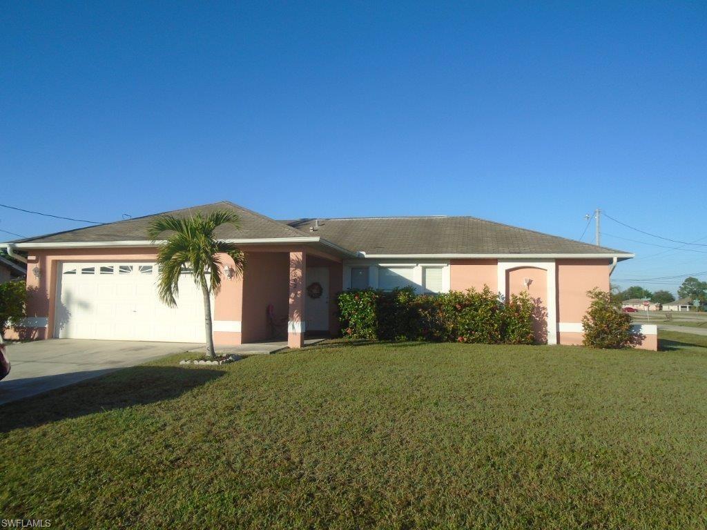 CONTEMPORARY in the center of Cape Coral !! Good condition and tenant occupied (sales clause) ready for an investor!!! OR owner occupied. Cathedral ceilings, double garage and corner lot.