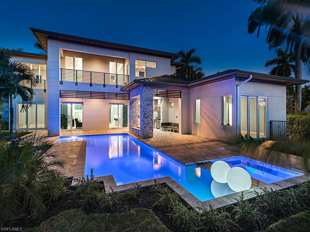 This new construction contemporary residence offers a spacious great room floor plan. Magnificent floor to ceiling glass, superlative quartz columns and French white oak floors frame the striking entry and conveys through the living room, kitchen and formal dining area. 

Boasting an expansive private outside entertainment area with a summer kitchen accented by an open flame fireplace.  The gourmet kitchen is appointed with a double island, butler’s pantry and chef’s desk.  State of the art appliances, Wolf, Sub-Zero and Bosch are realized throughout the home.  The second floor hosts a second master suite, family room, private study and guest kitchenette. State of the art surround sound, ample wine room and wet bar makes this estate perfect for entertaining. 

Located in Royal Harbor on an over-sized lot with a new 182-foot seawall that can accommodate multiple vessels. Royal Harbor is one Naples finest Waterfront communities that provides boaters with direct access to Naples Bay, the Ten Thousand Islands and the Gulf of Mexico.  This home is strategically located less than 5 minutes to the beach, world class shopping and dining of 5th Avenue South in Old Naples.