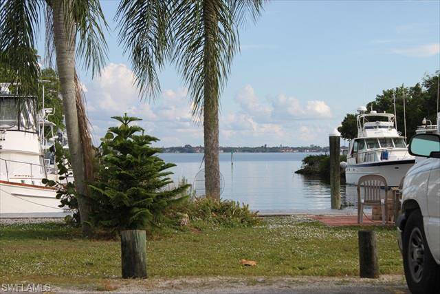 WOW, this beautiful 2 bedroom 2 bath ground floor unit in this quiet community faces west for spectacular sunsets, has a scenic background as a setting. It also has its own small cabana island which could be used for picnics or a wedding!  Carport with closet includes 2 bikes and a newer gas grill and you can offer on a 2008 Toyota Camry with only 26,000+/- miles on it separately! 
For those days inside this roomy condo boasts a newly remodeled kitchen, with large beautiful granite countertops, newer appliances and lots of additional cabinets added for storage, two remodeled bathrooms as well. If that isn't enough - we have full laundry area with full size appliances.
You only need your clothes and a bottle of champagne to celebrate your new home because we are leaving virtually everything else in place for your comfort!!!
