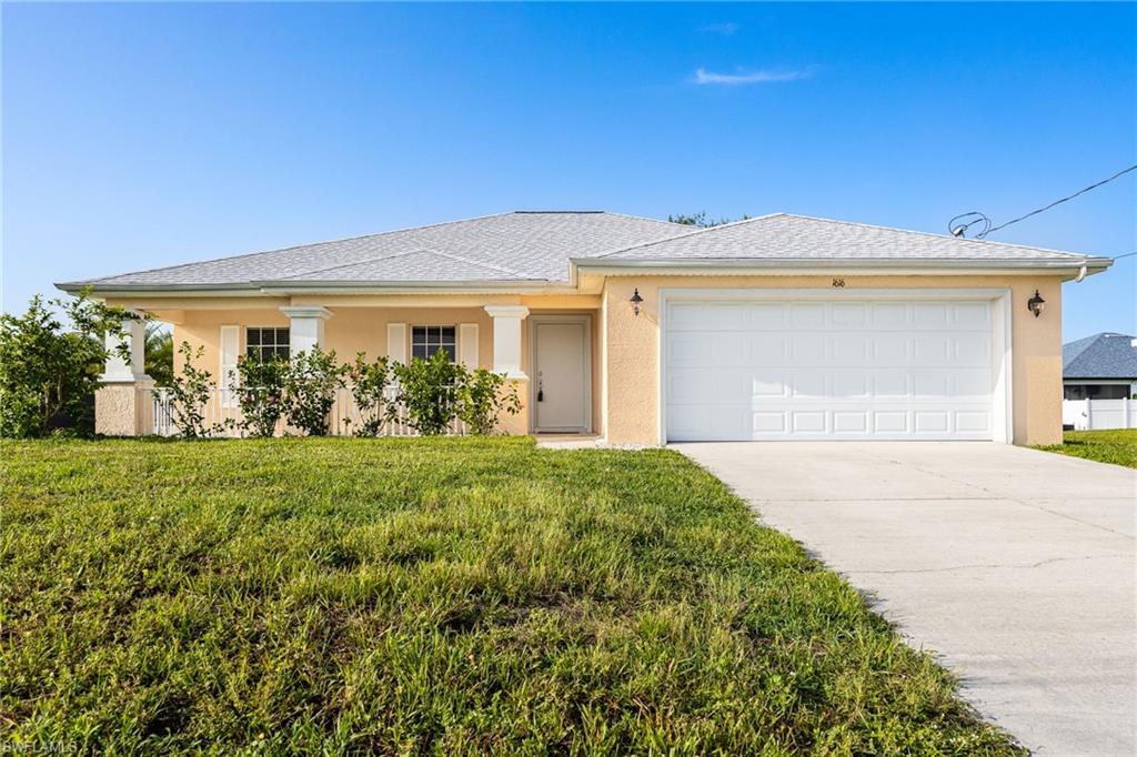 Welcome home to this beautifully maintained 3-bedroom + den, 2-bathroom residence, perfectly situated in a lovely NW Cape Coral neighborhood. From the charming covered front porch to the freshly painted interior and exterior and new roof (2023), this home offers comfort, style, and peace of mind from the moment you arrive.
Step inside to discover an inviting open-concept floor plan featuring a soaring cathedral ceiling, neutral finishes, attractive wood-look flooring throughout the main living areas, and new carpeting in the bedrooms and den. Impact-resistant windows and expansive sliding glass doors fill the home with abundant natural light, creating a bright and welcoming atmosphere. The private den with elegant French doors offers the perfect flex space for a home office, hobby room, playroom, or even a fourth bedroom if desired. Designed for both everyday living and entertaining, the spacious kitchen overlooks the living and dining areas and features white cabinetry, generous counter space, a convenient breakfast bar, and a sunny dining nook where family and friends can gather.
The relaxing primary suite offers dual closets and a private en suite bathroom complete with a step-in shower. Two additional guest bedrooms and a full guest bath provide comfortable accommodations for family and visitors alike. Step outside to your spacious screened lanai, where you can unwind while overlooking the backyard with mature trees. With southern rear exposure, you'll enjoy sunshine throughout the day, and there's plenty of room to add the pool you've always dreamed of! Additional features include an interior laundry area, an attached two-car garage, and a fantastic location just minutes from shopping, dining, schools, parks, and everything Cape Coral has to offer. Whether you're searching for your first home, a seasonal retreat, or your forever home, this move-in ready property offers the perfect combination of comfort, functionality, and Florida living. Schedule your private showing today!