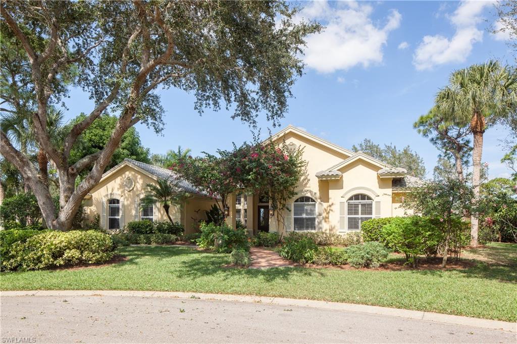 Privacy and tranquility are captured in this Stately home with lush landscaping situated on an oversized corner site on the cul de sac   …    A rare find.   This Custom Award winning home designed by Arthur Rutenberg Homes has been thoughtfully Re-designed with a classic casual elegance.  Well appointed and stylish with all the comforts of today.  Two bedrooms share a separate wing of the home with one bath and a VIP Guest Suite with bath are ideal for the extended family.  Showcased throughout the home are wood floors, custom baseboards and crown molding, plantation shutters, a 250 gallon propane tank for the gas fireplace, a two car garage with additional storage space.   The finely detailed living spaces enhanced by the kitchen and family room that open to the lanai and pool are perfect for entertaining.   So  many highlights evoking charm everywhere you look it has certainly proven to be the envy of the neighborhood.