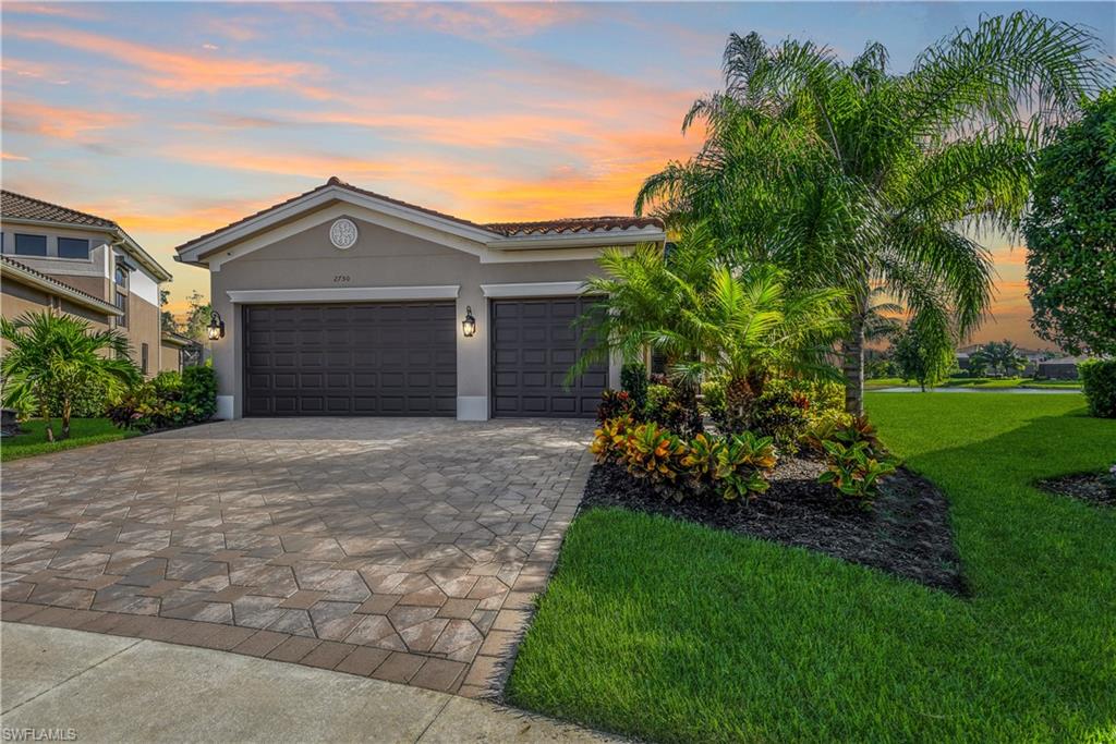 Stunning lakefront home on PREMIUM cul-de-sac lot! Merlot Model that offers an elegant floor plan allowing every member of the family to have their own space & privacy - master suite & one guest room on first floor and a guest suite and two guest rooms located off of the loft on second floor (see attached floor plan). Situated on a premium lot, one of the biggest in community w/ peaceful view of the lake & preserve areas. The versatile outdoor living space gives you enough room for a pool, playset, etc, in addition to the existing open lanai w/ full summer kitchen and large under truss sitting area. You will find luxury features throughout- volume ceilings, custom trim, plantation shutters, designer cabinets & granite countertops, Maple wood flooring & custom closet systems in master suite, high-end light fixtures & fans, solid core doors, ! For storm protection the home has impact resistant windows & doors, plus remote controlled Storm Safe fabric on the lanai. Riverstone is a gorgeous gated community w/ guard at gate 24/7 and offering activities for every member of the family w/ resort-style amenities- pool, tennis, fitness center, pickleball, kiddie play area, & more!