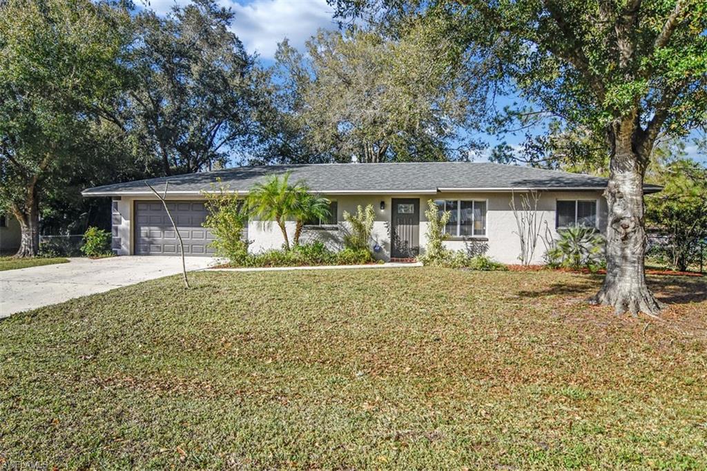 Do not miss this beautiful open 3 Bedroom 2  bathroom home with stunning updates. Feels like a brand new home with a 2 car attached garage and just under a half acre lot.  Gorgeous granite in the kitchen and bathrooms with solid wood cabinets and a deep undermount kitchen sink over looking the fenced in backyard with plenty of room for a pool. Comes with washer and dryer and security system. Fabulous plank tile flooring in the common areas and kitchen.  New shower and vanity attached to the master with pebble flooring.  New second bathroom with all updated tub shower combo and vanity. 
Newer roof, AC, plumbing, paint, flooring, kitchen and bathrooms with very tasteful light fixtures and ceiling fans through out the house.  Oversized fenced backyard with perfect gazebo to grill or chill under.  Make an appointment today to see this stunning home.  Truly nothing to do but move your furniture in and relax and enjoy.   Amazing central location with public boat ramp less than 2 miles away that leads straight to the gulf.  Park your RV or boat no problem.  Low taxes and city water and sewer.  Just 8 miles away from Babcock Ranch America's first solar town.  So much to do and see!