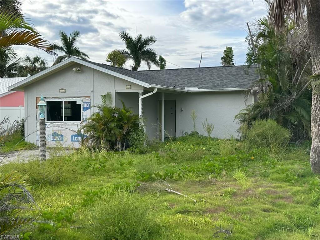 Exceptional opportunity to create your dream island retreat in one of Sanibel's most desirable locations! Situated on a spacious corner lot at 1653 Atlanta Plaza Drive, this 2-bedroom, 2-bath home offers approximately 1,200 square feet and is just a short walk or bike ride from Sanibel's world-famous shell-strewn beaches, charming boutiques, local restaurants, and vibrant shopping destinations.

With the finishing touches still to be completed, this property offers the perfect opportunity to customize and design your ideal island home. Much of the heavy lifting has already been done, with major restoration and infrastructure improvements completed to provide tremendous value and peace of mind for the next owner. Recent upgrades include a new roof, impact-resistant windows and doors, new HVAC system, all-new electrical wiring and panel, new PEX plumbing throughout, and a tankless water heater. Storm mitigation has been completed, and drywall and insulation have been professionally removed approximately 3-4 feet throughout the home, creating a clean slate for your choice of finishes and personal design vision.

Sanibel Island is renowned for its pristine white-sand beaches, breathtaking sunsets, abundant wildlife, and laid-back coastal lifestyle. Whether you're searching for a primary residence, seasonal getaway, vacation home, or investment opportunity, this property presents a rare chance to complete a home exactly to your tastes while enjoying one of Southwest Florida's most sought-after island communities.

Bring your imagination and transform this property into the perfect Sanibel sanctuary just moments from the beach, restaurants, shops, and everything island living has to offer.

Updated photos coming soon. Current photos are dated but provide a generally accurate representation of the property, and it is best appreciated in person.