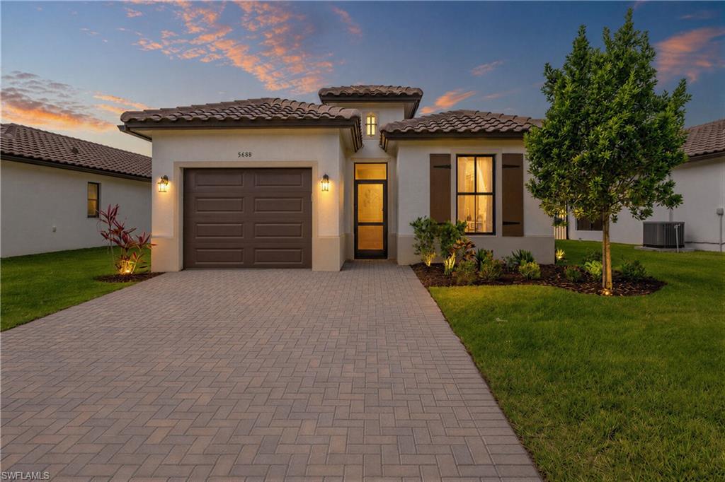 One or more photo(s) has been virtually staged, AI generated or rendered.  Experience the lifestyle that makes Ave Maria one of Southwest Florida's most sought-after communities. This beautifully upgraded 2-bedroom + den, 2-bath single-family home in Maple Ridge offers the perfect blend of comfort, style, and convenience.

Built just three years ago, the home features tile flooring throughout, an open-concept design, upgraded finishes, and a versatile den ideal for a home office, guest room, or additional living space. The bright and inviting living areas flow seamlessly to the screened lanai, where you'll enjoy one of the home's most desirable features—a beautiful lake view that creates the perfect backdrop for your morning coffee, evening cocktail, or simply unwinding after a long day. Imagine relaxing on your private lanai while watching the sunset reflect across the water and enjoying the peaceful setting that makes Southwest Florida living so special.

Your four-legged family members will love the fully fenced backyard, while the one-car garage and double-wide driveway provide ample parking, including room for your golf cart.

Life in Ave Maria is about much more than the home itself. Residents enjoy access to the Maple Ridge Clubhouse featuring a resort-style pool, fitness center, pickleball courts, basketball courts, playground, dog park, and a full calendar of social events. Hop on your golf cart and explore the town center, restaurants, shopping, parks, walking trails, and everything that has made Ave Maria one of the fastest-growing communities in Southwest Florida.

Whether you're looking for peaceful waterfront views, an active lifestyle, or a true sense of community, this home offers the best of it all.