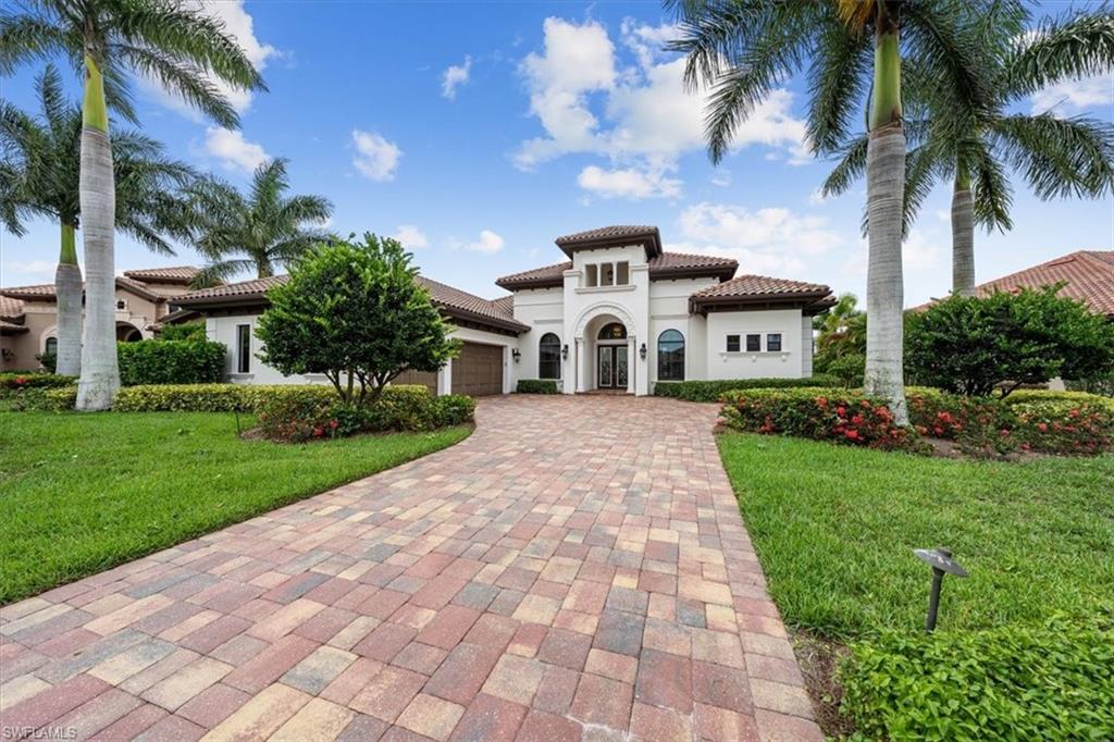 H2773 Incredible waterfront 4 bedroom home in exclusive Lakoya. Extensive upgrades including new built-ins, wood flooring (bedrooms) and upgraded lighting throughout the home. Wine/beverage room with custom cabinets & tile plus a Sub-Zero wine cooler and U-Line beverage frig. Serene master bedroom with walk-in closets, a large linen closet plus sumptuous bath with dual vanities and walk-in shower. Stainless steel kitchen includes new 6 burner Wolf Cooktop plus wall oven. Beautiful Dining Area with new rounded window. Expansive outdoor living with fire bowl and resurfaced saltwater pool. Ample counter seating around outdoor kitchen with new Wolf grill, sink and refrigerator. Recently painted exterior, 3-car garage and new electric storm shutters on lanai. Tastefully furnished by Clive Daniel. Lakoya is the premier, gated neighborhood within Lely. The list of amenities at The Players Club and Spa is seemingly endless. This home is waiting for you!