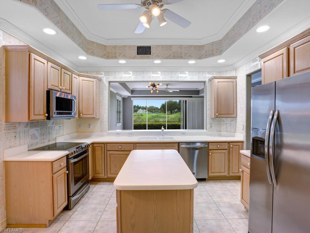 This coach home is located in the gated community of Kensington Golf & Country Club, which offers some of SWFL’s best golf, tennis, fitness and country club living while being close to beaches, shopping and entertainment. Kensington Country Club offers a range of membership options, but membership is NOT mandatory. This home offers 2 bedrooms plus a den with two bathrooms. The best part of this home is the view from your lanai of the 11th hole.