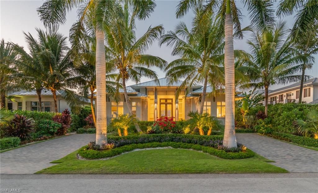 Located in the heart of Olde Naples, blocks from the beaches, boutiques, art galleries & restaurants of 3rd Street S & from the night-life & shopping of 5th Avenue S. This Falconer Jones designed home was built by BBA Construction and consist of 4 bedrooms plus a den, 4 full baths and 2 half baths and 4 car garage. The open floor plan features a gourmet kitchen with a oversized marble island, Miele appliances, 2 dishwashers and wine refrigeration. The great room opens to 2 covered outdoor living/entertaining areas, pool, spa, fireplace and 2 fire bowls. Interior finishes include European wide plank floors throughout, Elan G home automation system, electric roll down screens, shutters and clear panels. The exterior features a standing seam metal roof, total concrete block construction and mahogany front door.There is a marina with slips available just blocks from the home. Meticulously maintained builders personal residence. Includes a 1 year warranty.