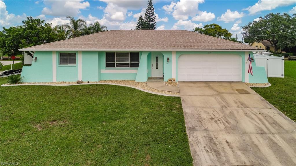 Updated Waterfront Home!  Enjoy direct access to the Gulf of Mexico from your backyard!  You will love this inviting 3-bedroom home featuring split floor plan with 2 full baths!   The updated kitchen features granite countertops, beautiful cabinetry, stainless appliances and window serve through to lanai… perfect for entertaining! Both full baths have been fully updated as well as the tile flooring throughout.  Other features include: large lanai, 2 stall garage and fenced backyard.  The waterfront features a 10k lb boat lift and new dock with less than ten minutes to open water.  The new dock offers electric, water and room for entertaining!  This move-in-ready home is the best price per square foot (with a quarter acre lot) in the entire neighborhood! Bonus: All Assessments are PAID! Schedule your private showing today and ENJOY!