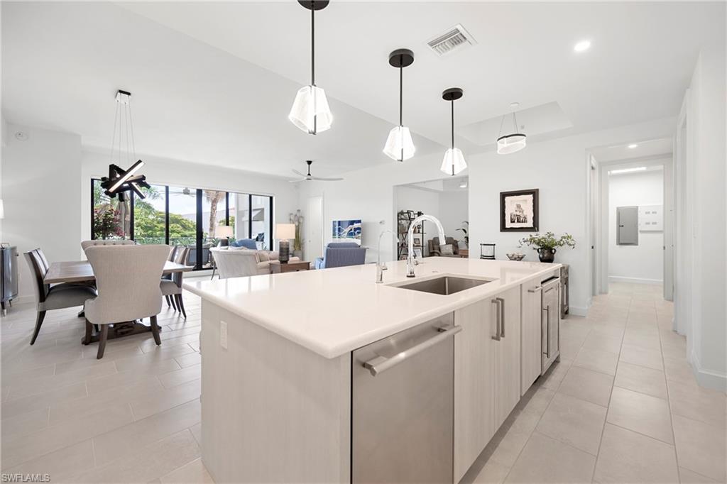Eleven Eleven Central offers the perfect blend of modern design, comfort, and convenience. This recently built Boca floor plan is filled with natural light creating a bright and welcoming atmosphere throughout.
Offering 1,982 square feet of living space, this 2-bedroom plus den residence lives large with an open, functional layout designed for everyday living and entertaining. Both bedrooms feature private en-suite baths and spacious walk-in closets, while upgraded tile flooring throughout provides a clean, contemporary look with no carpet to maintain.
The kitchen is a standout, featuring premium Thermador appliances, an upgraded panel-front refrigerator, natural gas cooking, and one of the building's most desirable features—a private gas grill on the lanai. A large walk-in pantry provides plenty of additional storage.
Other notable upgrades include a beautifully finished laundry room with custom cabinetry. Storage is abundant with a private climate-controlled storage area, including a convenient storage cage located on the same floor as the residence for easy access, plus an additional secure storage locker in the common garage area.

Located in the heart of Downtown Naples, you're just steps from Baker Park, the new Gulfshore Playhouse, shopping, dining, and everything that makes Naples such a sought-after destination and just under 1 mile to the beautiful Gulf beaches. Eleven Eleven Central residents enjoy an impressive collection of resort-style amenities, including complimentary shuttle bus, a state of the art fitness center, pool and spa, social room, game room, movie theater, dog wash station, and fenced in dog run.

PID: 07129003062